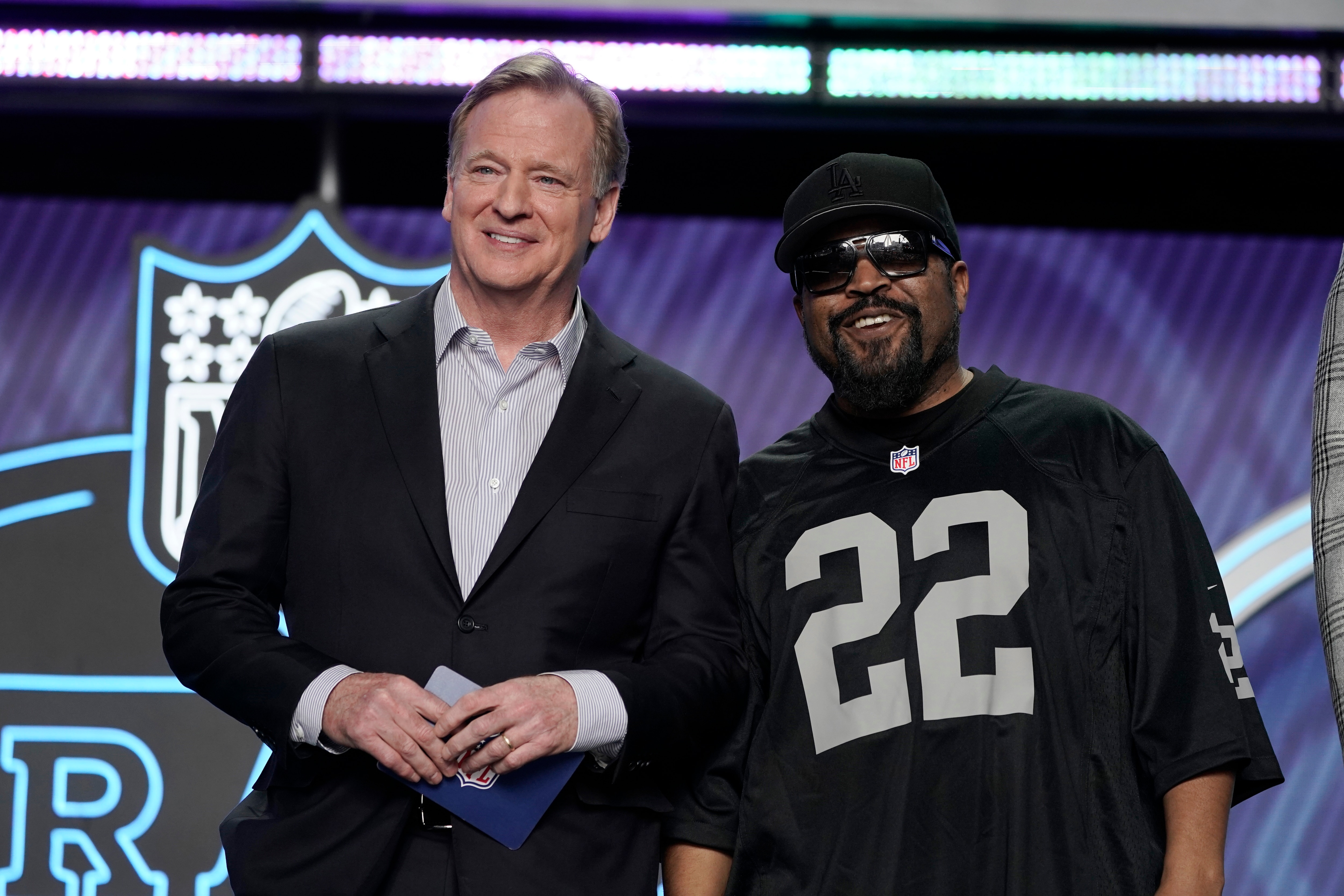 Rapper Ice Cube, right, poses for a photo with NFL Commissioner Roger Goodell during the first round of the NFL football draft Thursday, April 28, 2022, in Las Vegas. (AP Photo/John Locher)