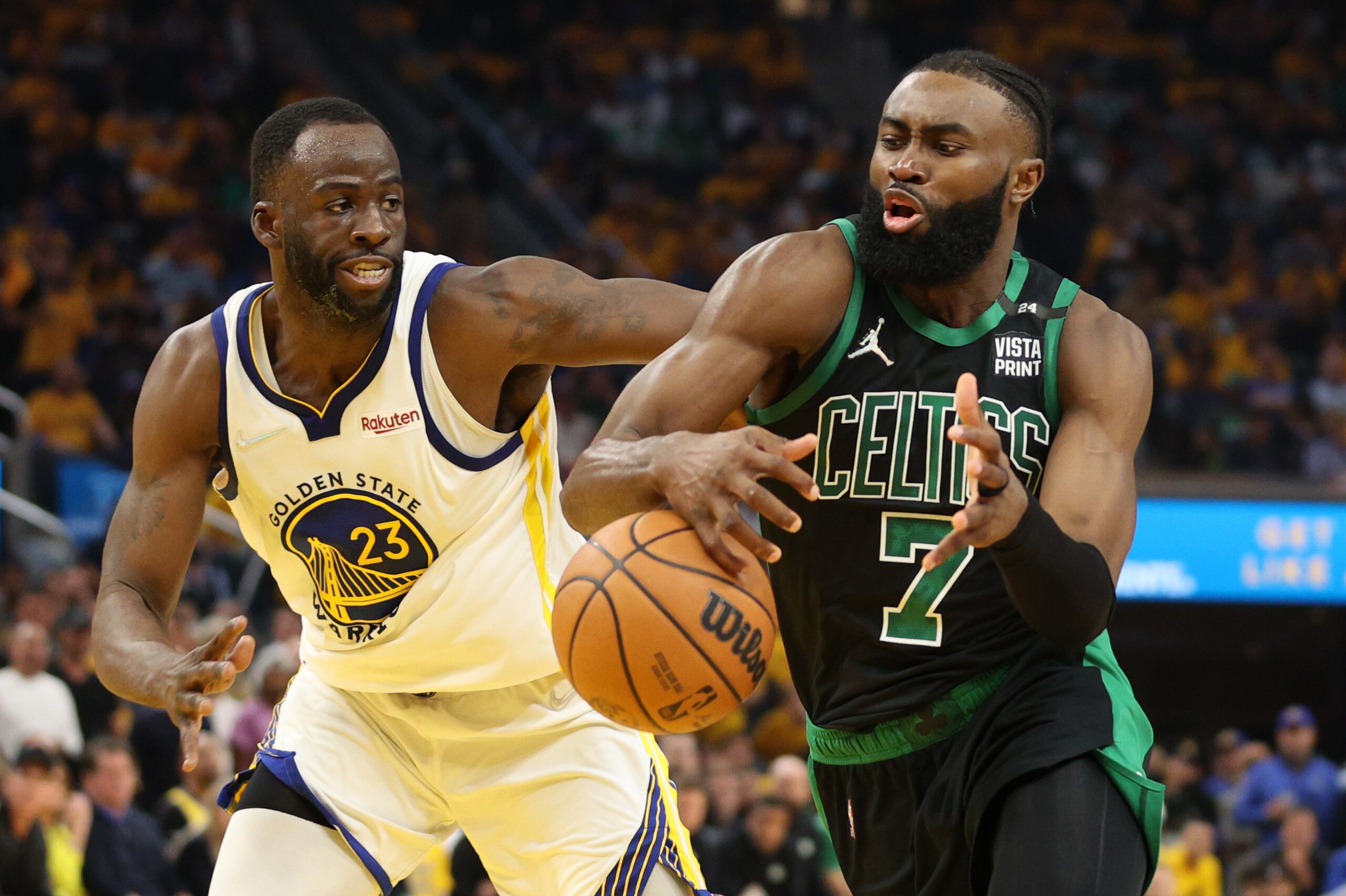 SAN FRANCISCO, CALIFORNIA - JUNE 13: Jaylen Brown #7 of the Boston Celtics loses control of the ball against Draymond Green #23 of the Golden State Warriors during the second quarter in Game Five of the 2022 NBA Finals at Chase Center on June 13, 2022 in San Francisco, California. NOTE TO USER: User expressly acknowledges and agrees that, by downloading and/or using this photograph, User is consenting to the terms and conditions of the Getty Images License Agreement. (Photo by Ezra Shaw/Getty Images)