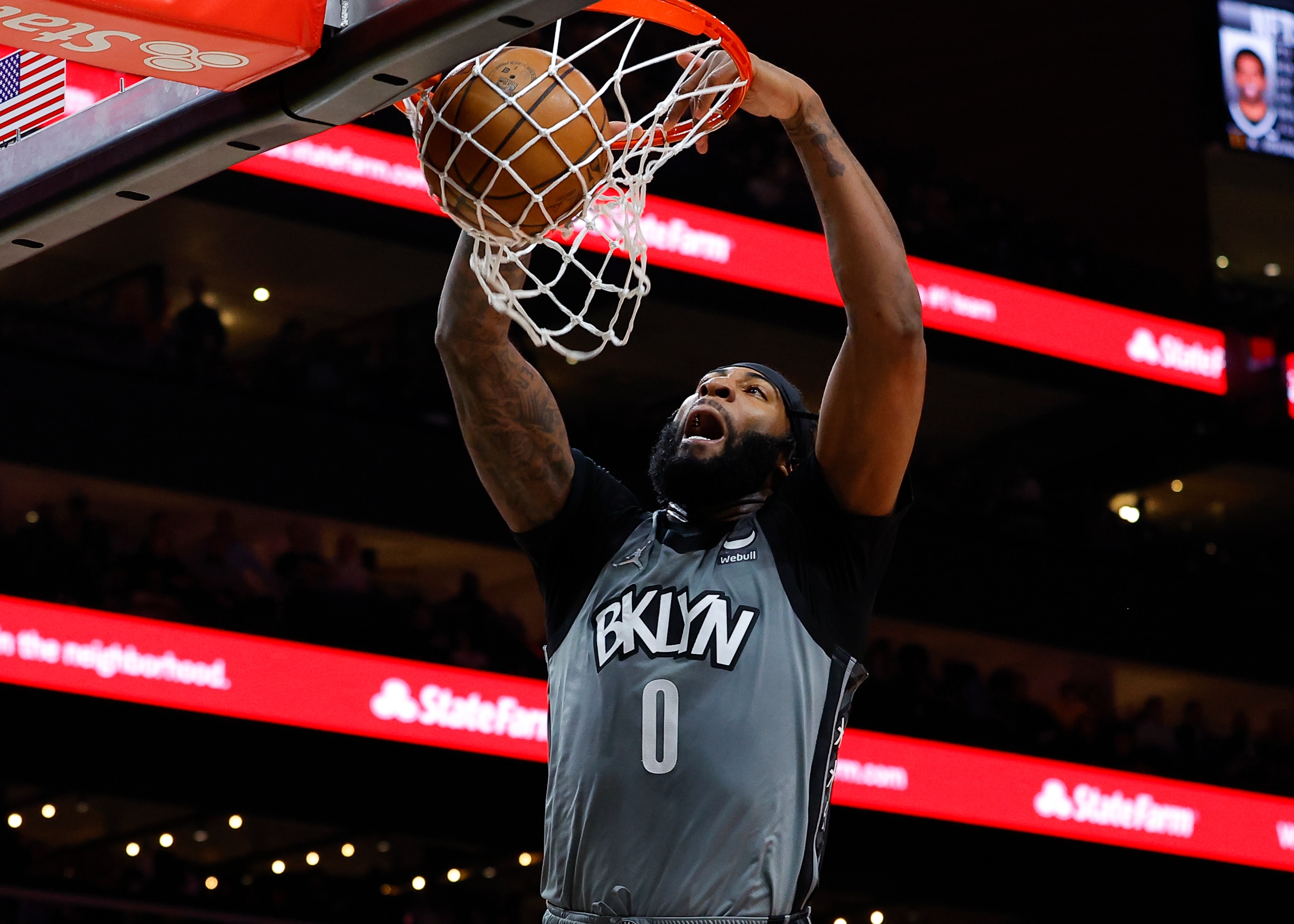 ATLANTA, GA - APRIL 02: Andre Drummond #0 of the Brooklyn Nets dunks during the first half against the Atlanta Hawks at State Farm Arena on April 2, 2022 in Atlanta, Georgia. NOTE TO USER: User expressly acknowledges and agrees that, by downloading and or using this photograph, User is consenting to the terms and conditions of the Getty Images License Agreement. (Photo by Todd Kirkland/Getty Images)