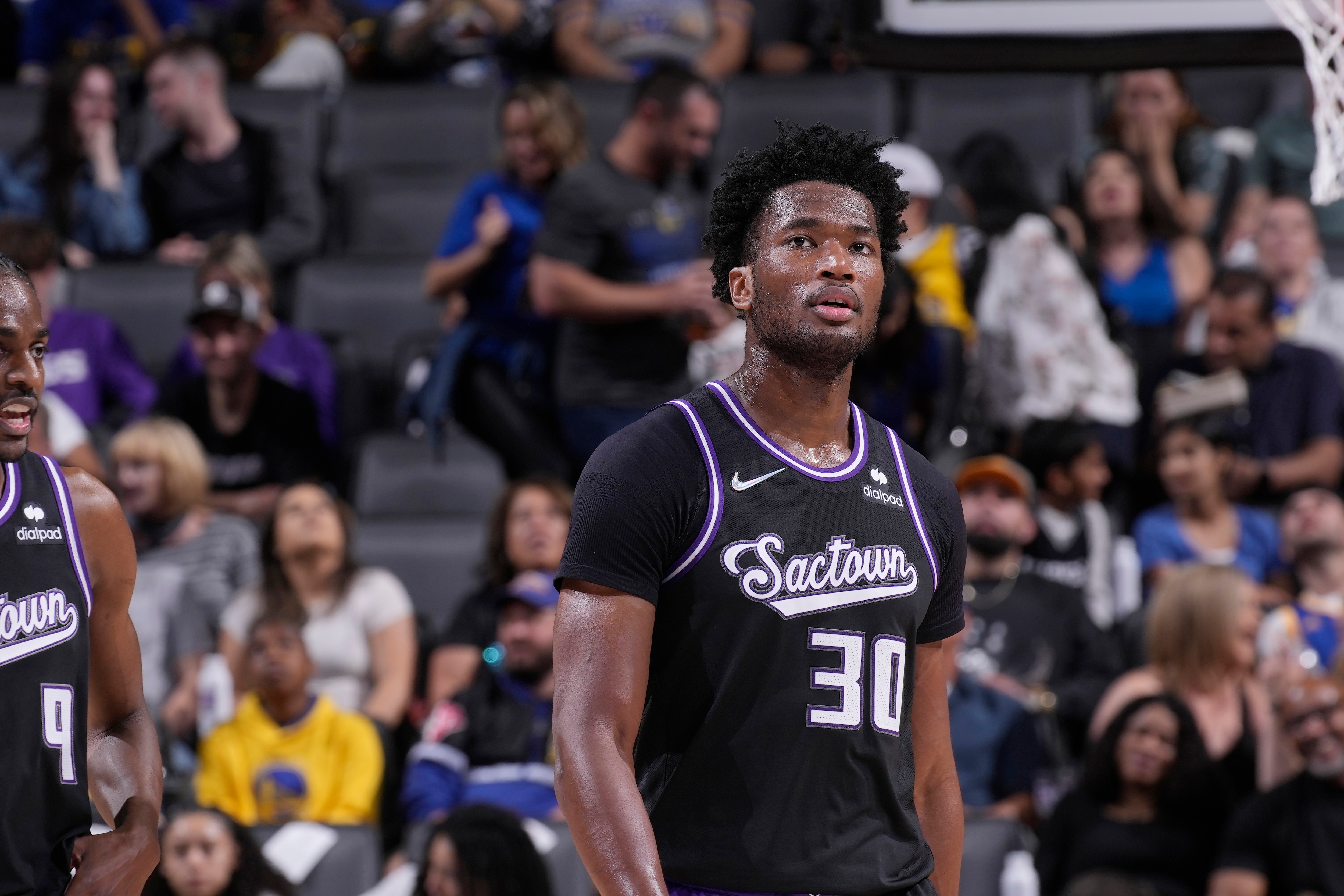 SACRAMENTO, CA - APRIL 3: Damian Jones #30 of the Sacramento Kings looks on during the game against the Golden State Warriors on April 3, 2022 at Golden 1 Center in Sacramento, California. NOTE TO USER: User expressly acknowledges and agrees that, by downloading and or using this photograph, User is consenting to the terms and conditions of the Getty Images Agreement. Mandatory Copyright Notice: Copyright 2022 NBAE (Photo by Rocky Widner/NBAE via Getty Images)