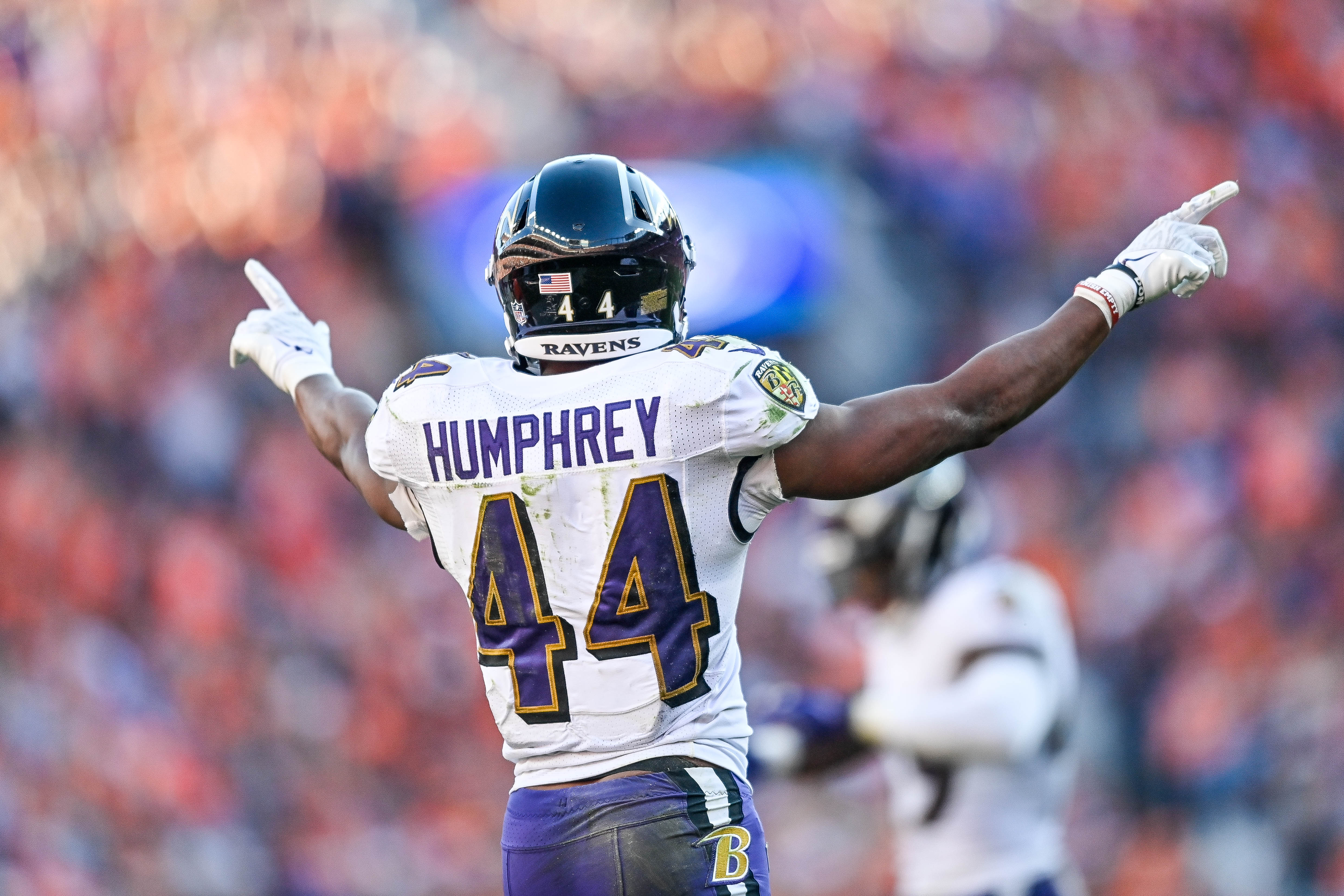 DENVER, CO - OCTOBER 3:  Marlon Humphrey #44 of the Baltimore Ravens celebrates a pass defended against the Denver Broncos in the fourth quarter of a game at Empower Field at Mile High on October 3, 2021 in Denver, Colorado. (Photo by Dustin Bradford/Getty Images)