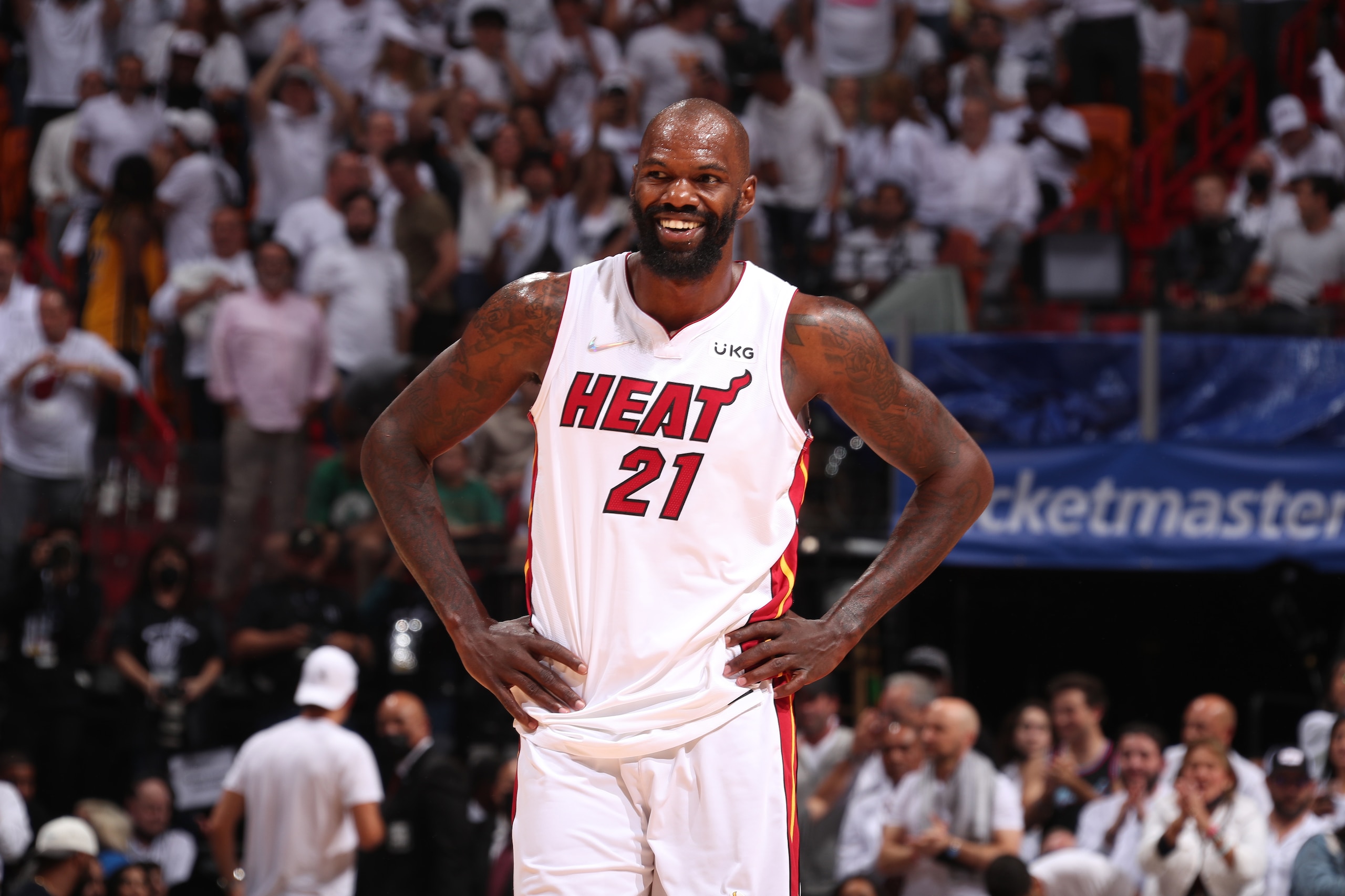 MIAMI, FL - MAY 17: Dewayne Dedmon #21 of the Miami Heat smiles and looks on during the game against the Boston Celtics during Game 1 of the 2022 NBA Playoffs Eastern Conference Finals on May 17, 2022 at FTX Arena in Miami, Florida. NOTE TO USER: User expressly acknowledges and agrees that, by downloading and or using this Photograph, user is consenting to the terms and conditions of the Getty Images License Agreement. Mandatory Copyright Notice: Copyright 2022 NBAE (Photo by Issac Baldizon/NBAE via Getty Images)