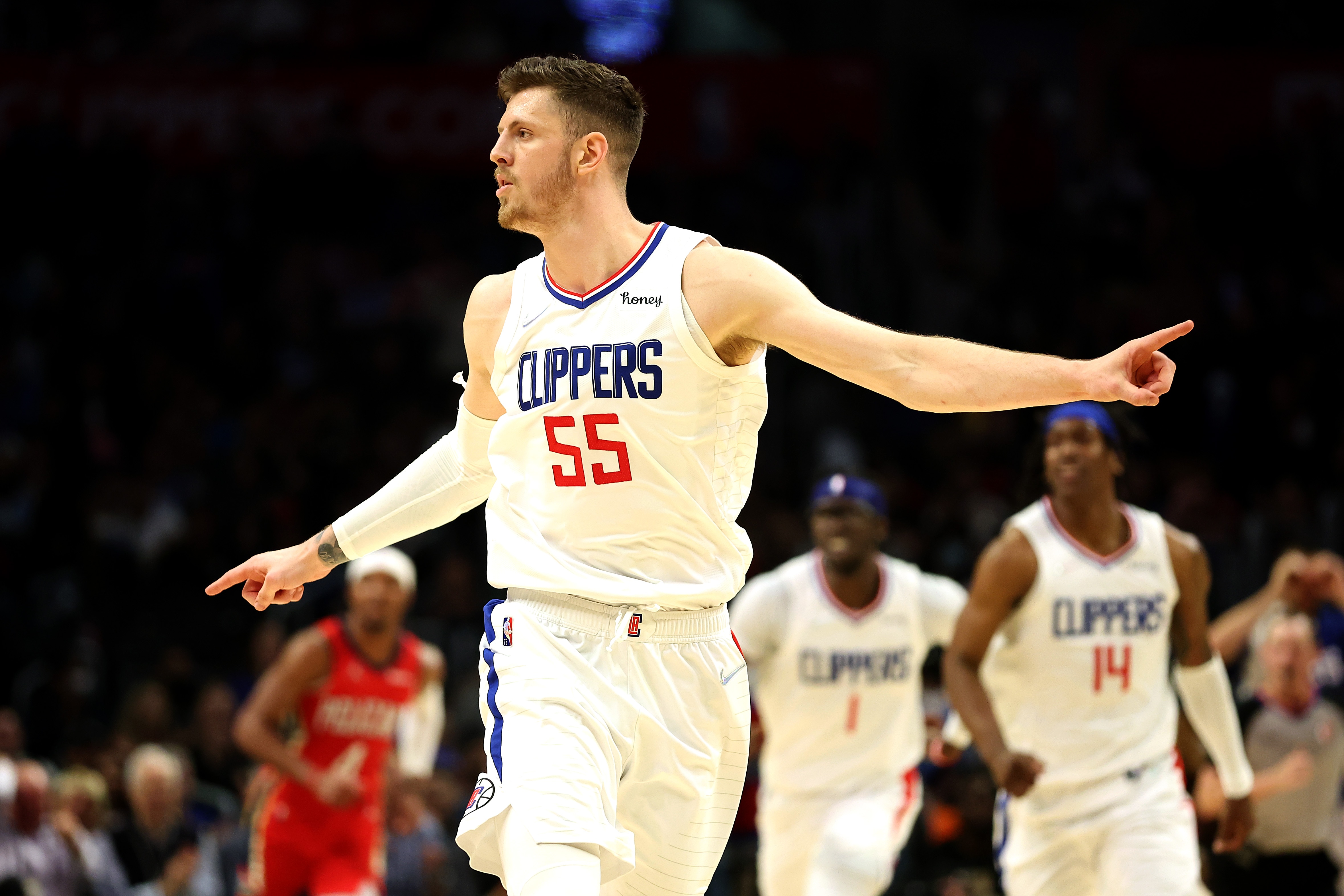 LOS ANGELES, CALIFORNIA - APRIL 03: Isaiah Hartenstein #55 of the LA Clippers reacts after making a shot during the second half of a game against the New Orleans Pelicans at Crypto.com Arena on April 03, 2022 in Los Angeles, California. NOTE TO USER: User expressly acknowledges and agrees that, by downloading and/or using this Photograph, user is consenting to the terms and conditions of the Getty Images License Agreement. Mandatory Copyright Notice: Copyright 2022 NBAE (Photo by Sean M. Haffey/Getty Images)