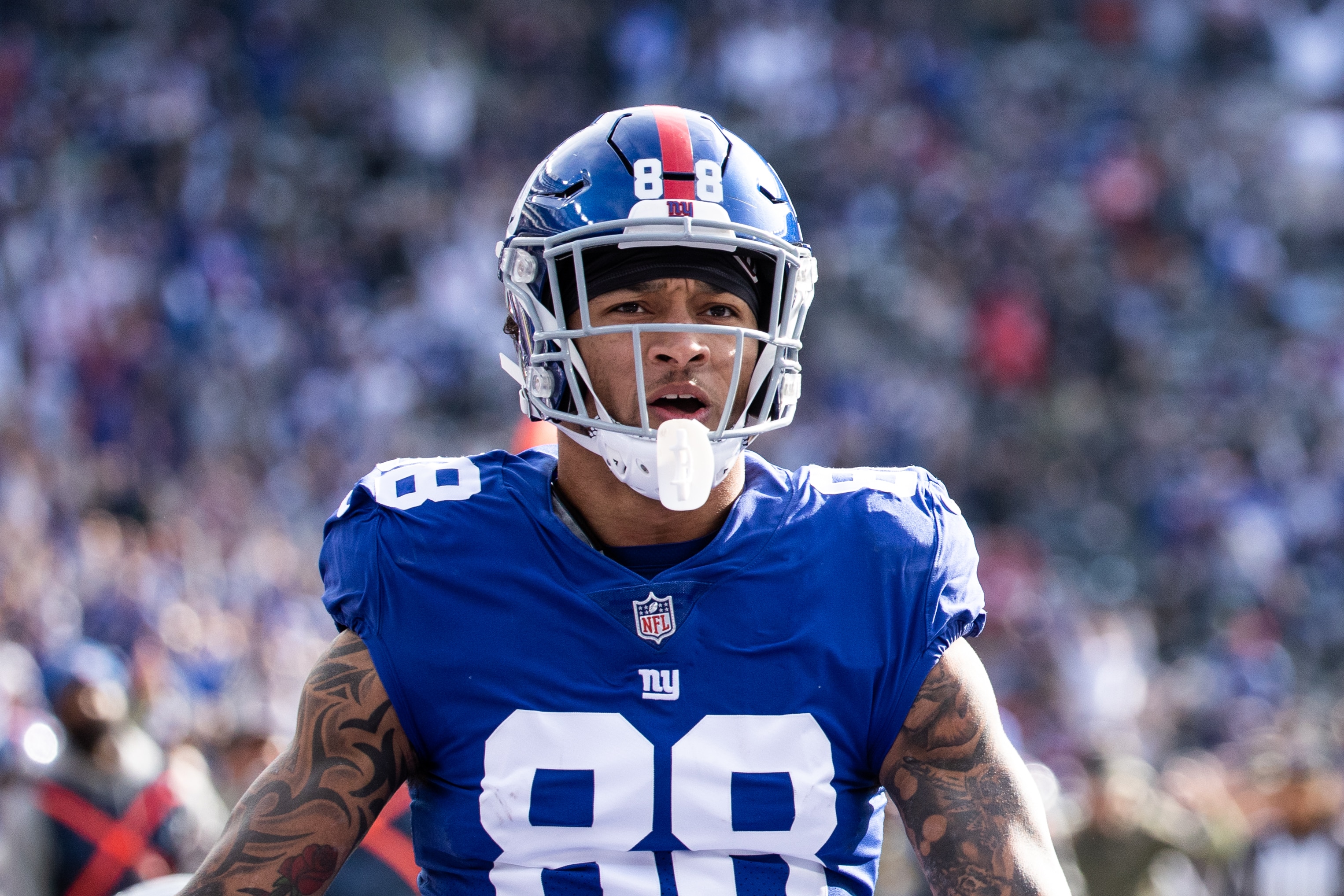 EAST RUTHERFORD, NJ - NOVEMBER 07: Evan Engram #88 of the New York Giants reacts after scoring a touchdown during the first quarter in the game against the Las Vegas Raiders at MetLife Stadium on November 07, 2021 in East Rutherford, New Jersey. (Photo by Dustin Satloff/Getty Images)
