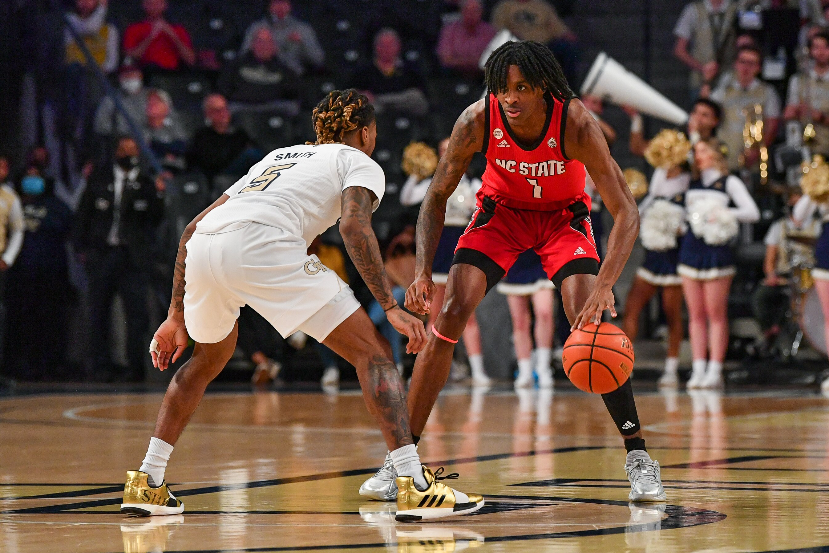 ATLANTA, GA  FEBRUARY 15:  NC State guard Dereon Seabron (1) is guarded by Georgia Tech guard Deivon Smith (5) during the ACC college basketball game between the North Carolina State Wolfpack and the Georgia Tech Yellow Jackets on February 15th, 2022 at Hank McCamish Pavilion in Atlanta, GA.  (Photo by Rich von Biberstein/Icon Sportswire via Getty Images)