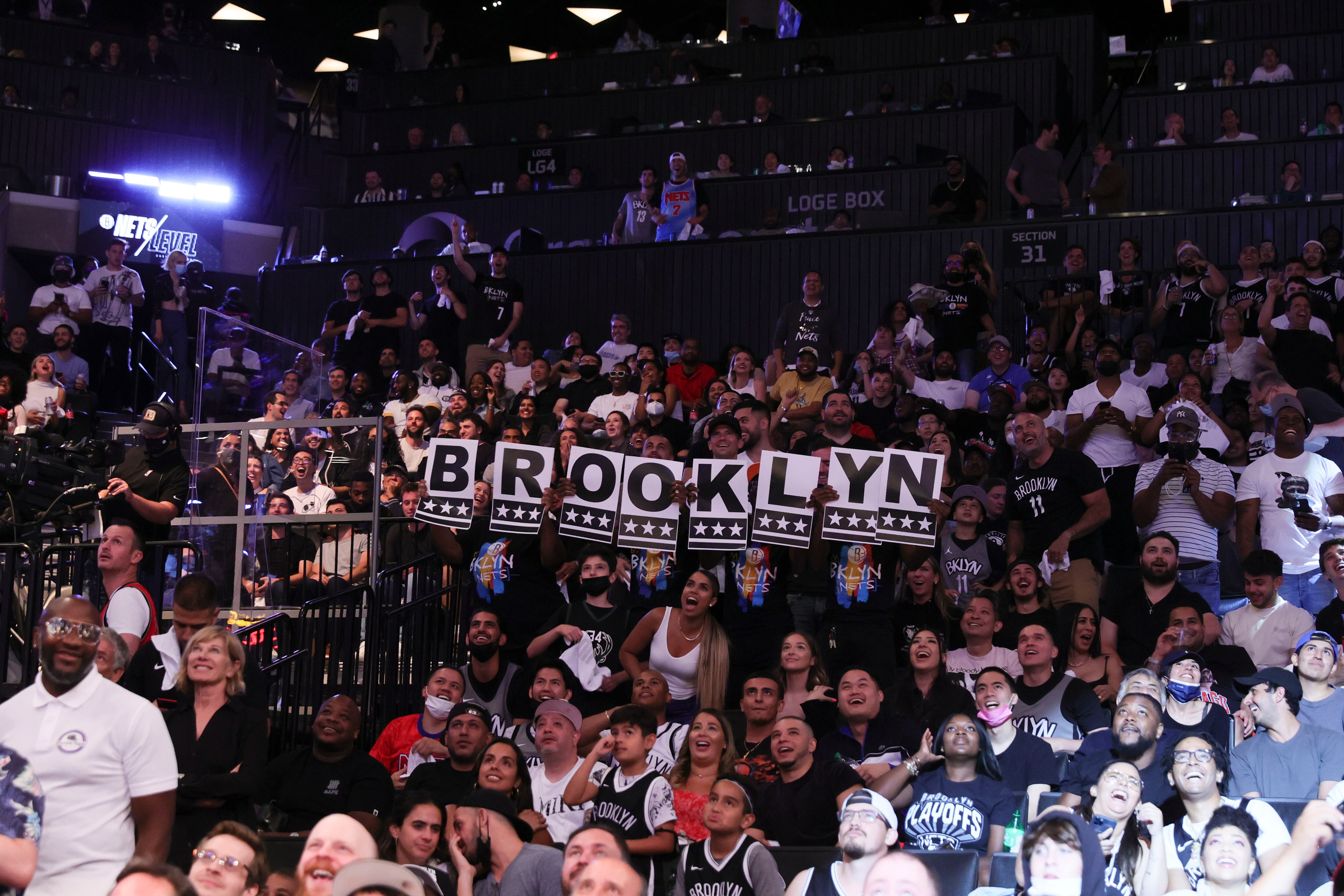 BROOKLYN, NY - JUNE 19: Brooklyn Nets fans cheer during the game against the Milwaukee Bucks during Round 2, Game 7 of the 2021 NBA Playoffs on June 19, 2021 at Barclays Center in Brooklyn, New York. NOTE TO USER: User expressly acknowledges and agrees that, by downloading and or using this Photograph, user is consenting to the terms and conditions of the Getty Images License Agreement. Mandatory Copyright Notice: Copyright 2021 NBAE (Photo by Nathaniel S. Butler/NBAE via Getty Images)