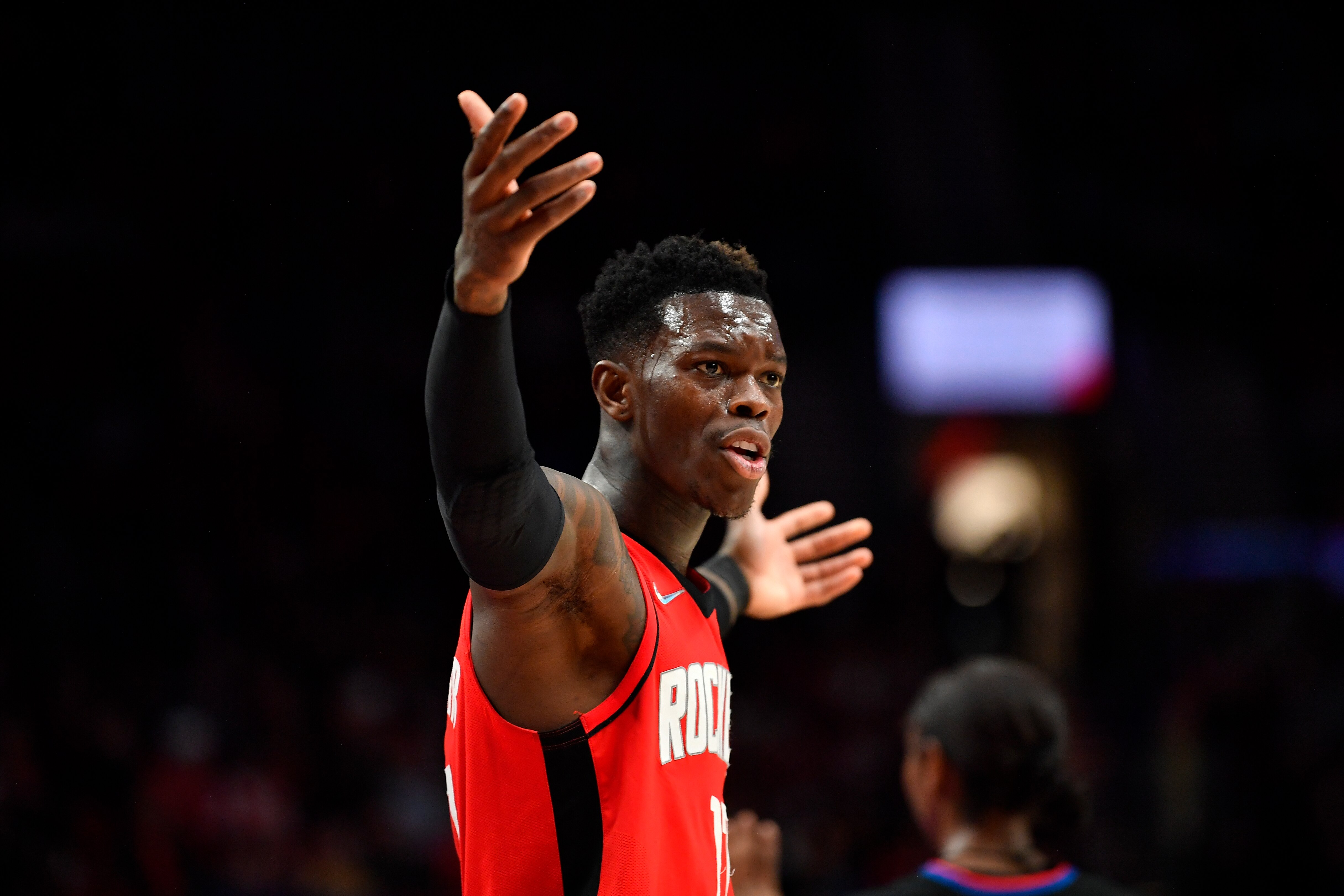 PORTLAND, OREGON - MARCH 26: Dennis Schroder #17 of the Houston Rockets gestures during the fourth quarter against the Portland Trail Blazers at the Moda Center on March 26, 2022 in Portland, Oregon. The Houston Rockets won 115-98. NOTE TO USER: User expressly acknowledges and agrees that, by downloading and or using this photograph, User is consenting to the terms and conditions of the Getty Images License Agreement. (Photo by Alika Jenner/Getty Images)