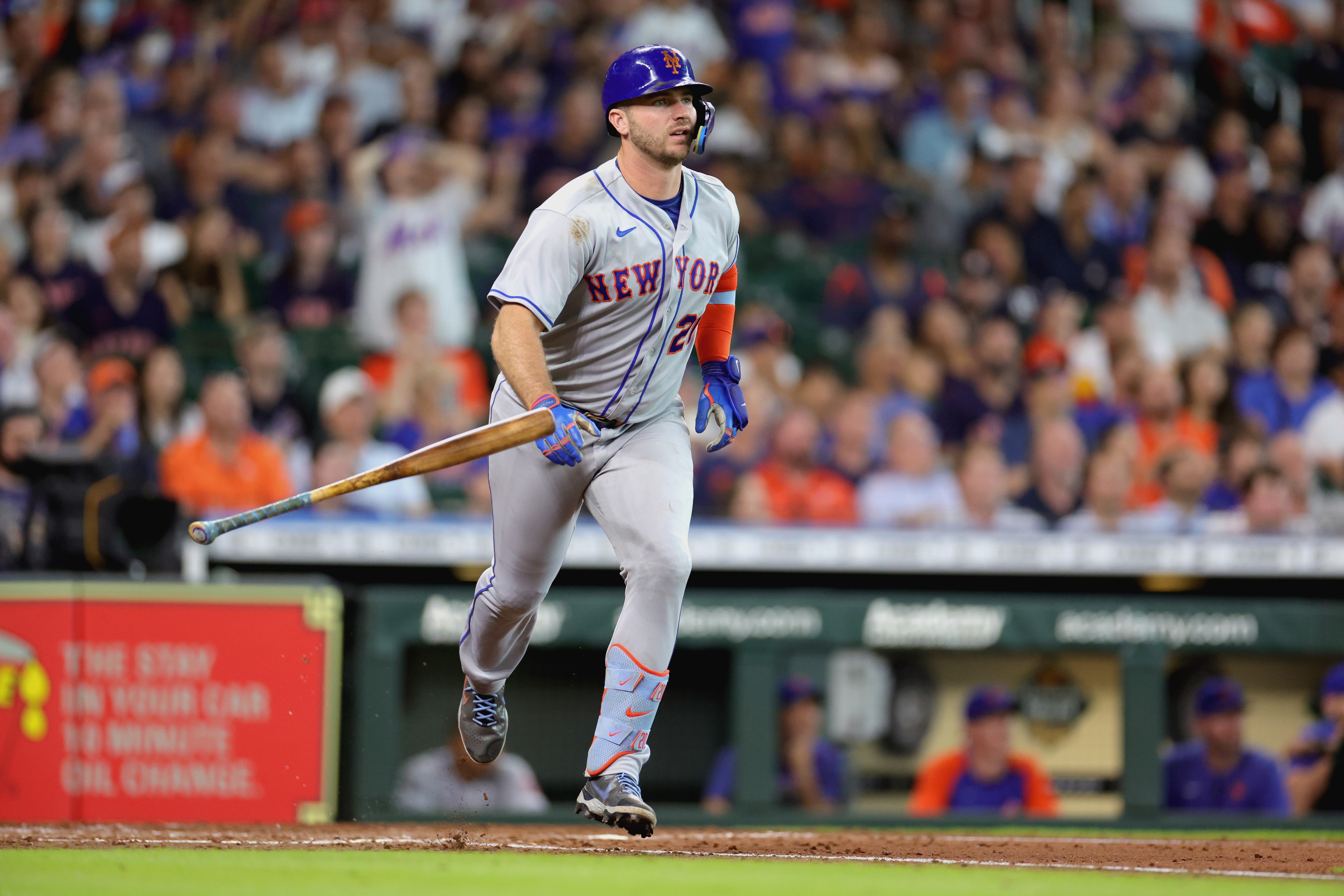 HOUSTON, TEXAS - JUNE 22: Pete Alonso #20 of the New York Mets hits a sacrifice fly during the sixth inning against the Houston Astros at Minute Maid Park on June 22, 2022 in Houston, Texas. (Photo by Carmen Mandato/Getty Images)
