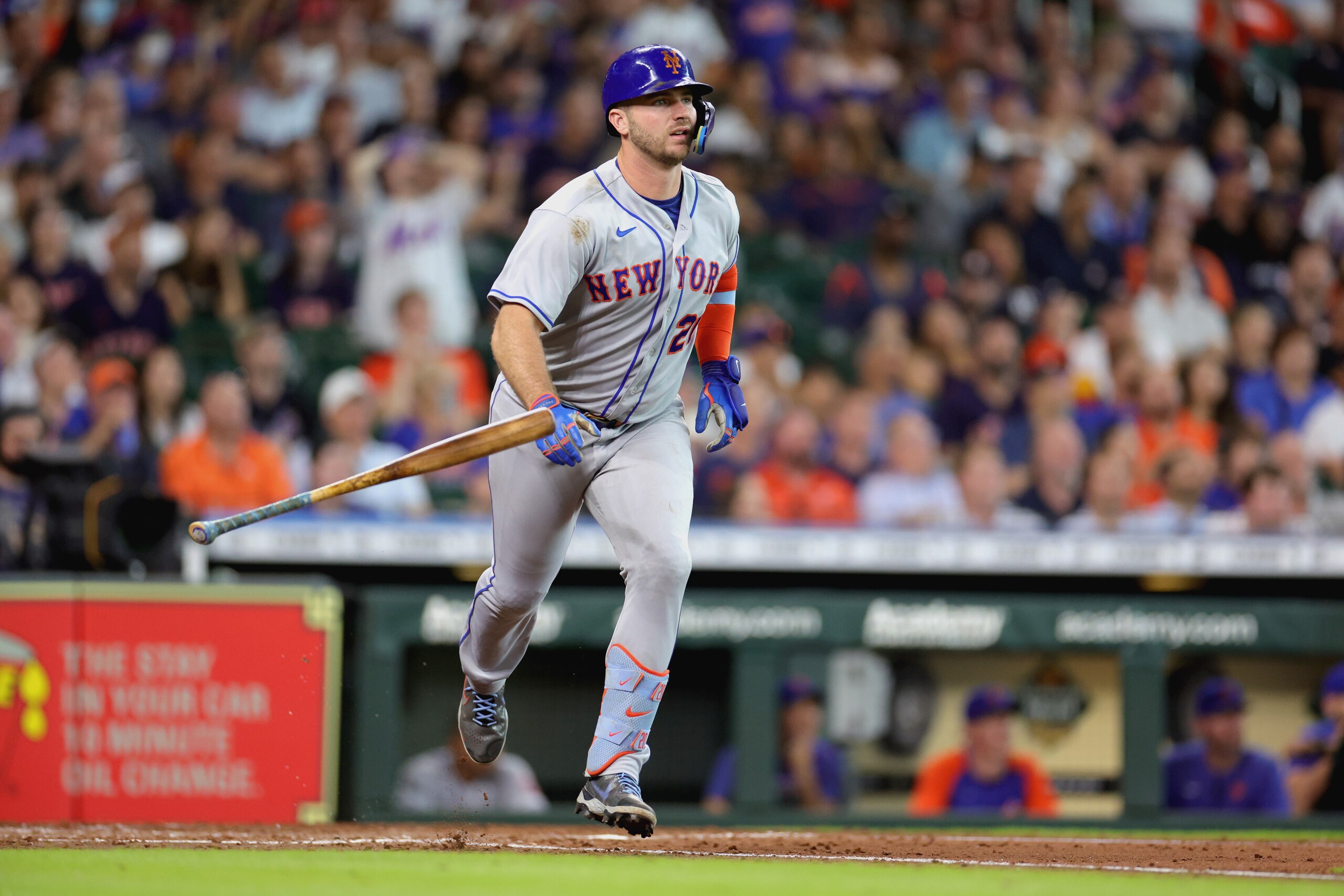 HOUSTON, TEXAS - JUNE 22: Pete Alonso #20 of the New York Mets hits a sacrifice fly during the sixth inning against the Houston Astros at Minute Maid Park on June 22, 2022 in Houston, Texas. (Photo by Carmen Mandato/Getty Images)