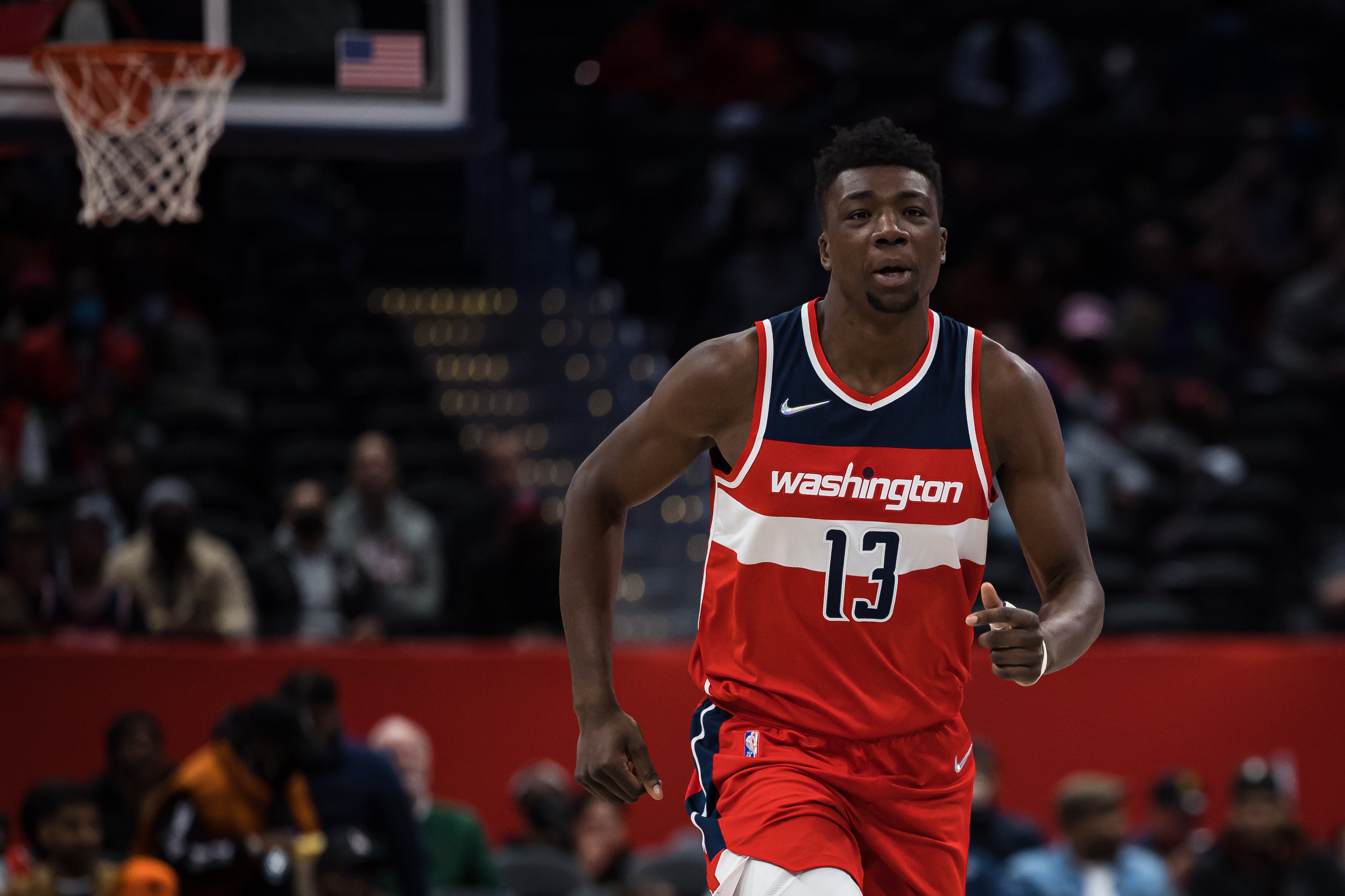 WASHINGTON, DC - MARCH 04: Thomas Bryant #13 of the Washington Wizards in action against the Atlanta Hawks during the first half at Capital One Arena on March 4, 2022 in Washington, DC. NOTE TO USER: User expressly acknowledges and agrees that, by downloading and or using this photograph, User is consenting to the terms and conditions of the Getty Images License Agreement. (Photo by Scott Taetsch/Getty Images)