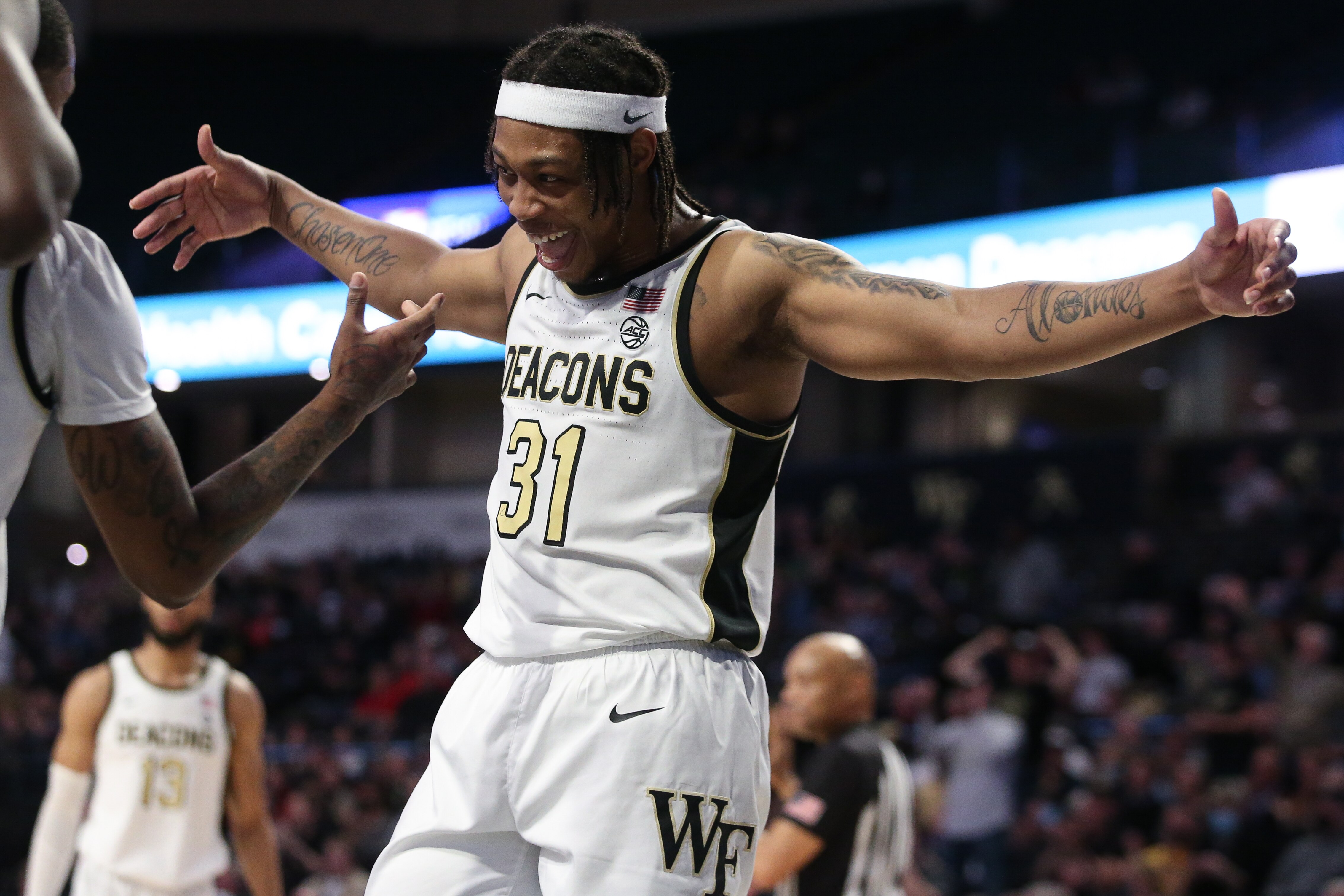 WINSTON-SALEM, NC - MARCH 02: Wake Forest Demon Deacons guard Alondes Williams (31) celebrates a contested shot during the college basketball game between NC State and Wake Forest on March 2, 2022 at Lawrence Joel Veterans Memorial Coliseum. (Photo by Nicholas Faulkner/Icon Sportswire via Getty Images)