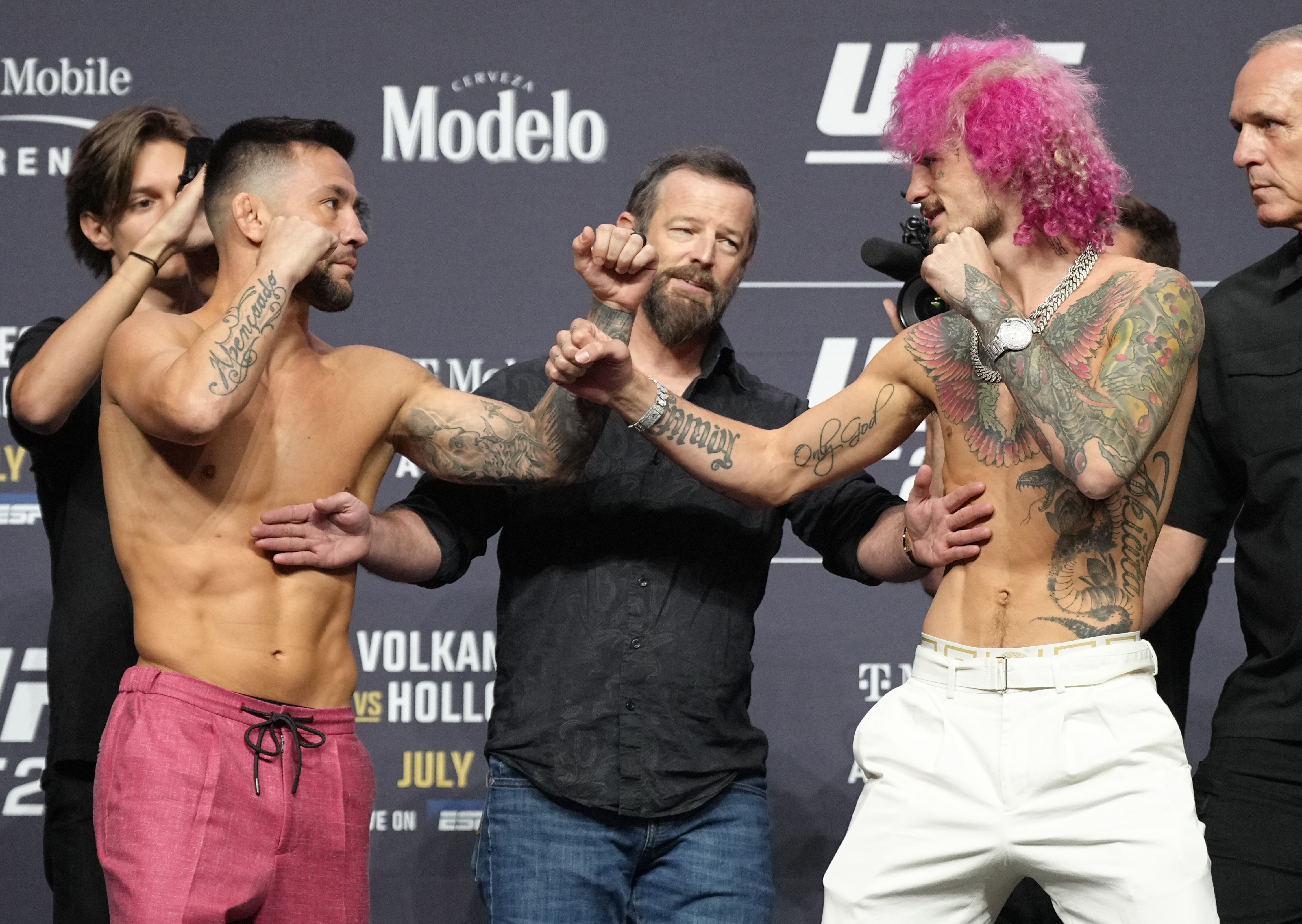 LAS VEGAS, NEVADA - JUNE 30: (L-R) Opponents Pedro Munhoz of Brazil and Sean O'Malley face off during the UFC 276 press conference at T-Mobile Arena on June 30, 2022 in Las Vegas, Nevada. (Photo by Jeff Bottari/Zuffa LLC)