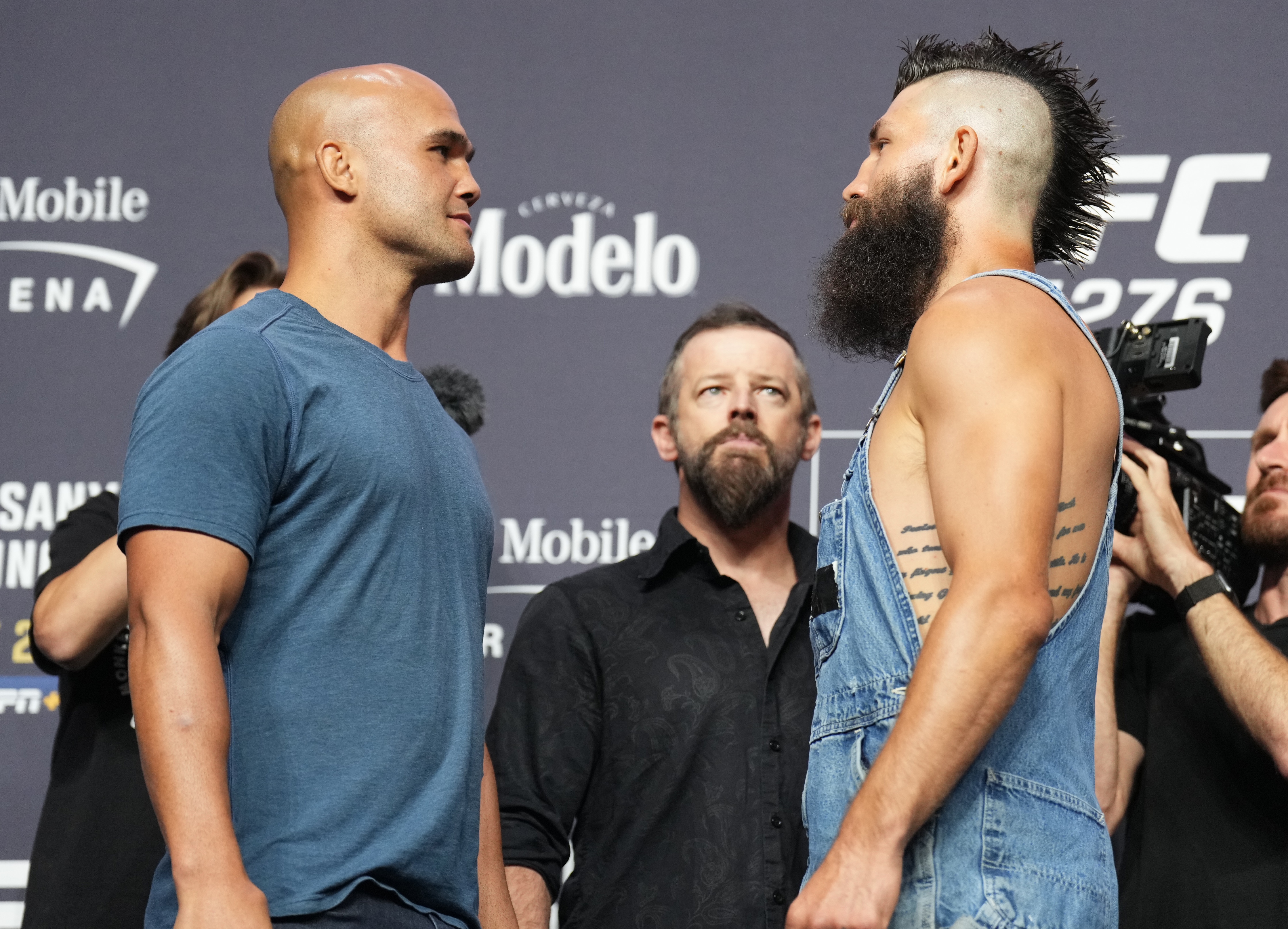 LAS VEGAS, NEVADA - JUNE 30: (L-R) Opponents Robbie Lawler and Bryan Barberena face off during the UFC 276 press conference at T-Mobile Arena on June 30, 2022 in Las Vegas, Nevada. (Photo by Chris Unger/Zuffa LLC)