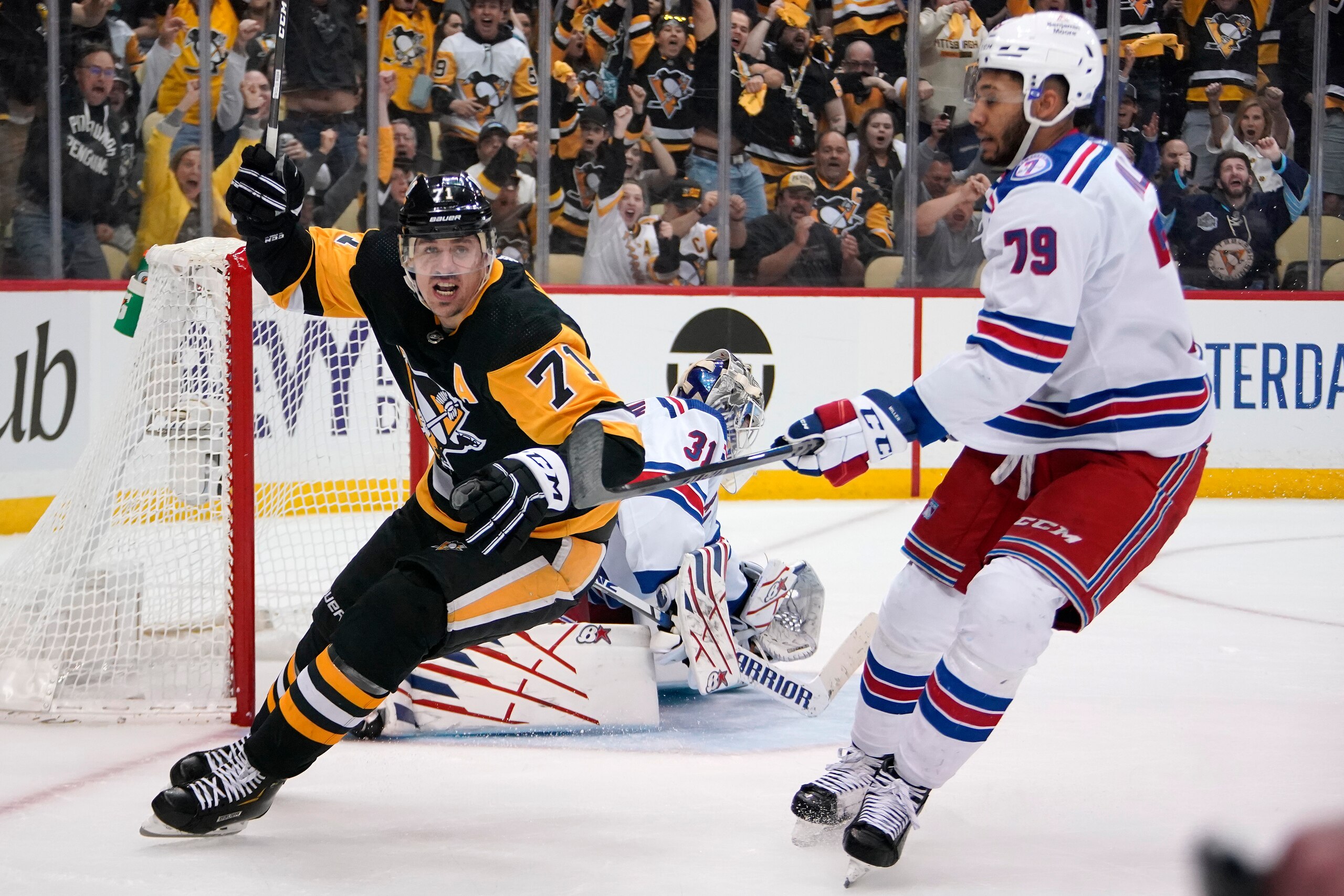 Pittsburgh Penguins' Evgeni Malkin (71) celebrates his goal during the second period in Game 6 of an NHL hockey Stanley Cup first-round playoff series against the New York Rangers in Pittsburgh, Friday, May 13, 2022. (AP Photo/Gene J. Puskar)