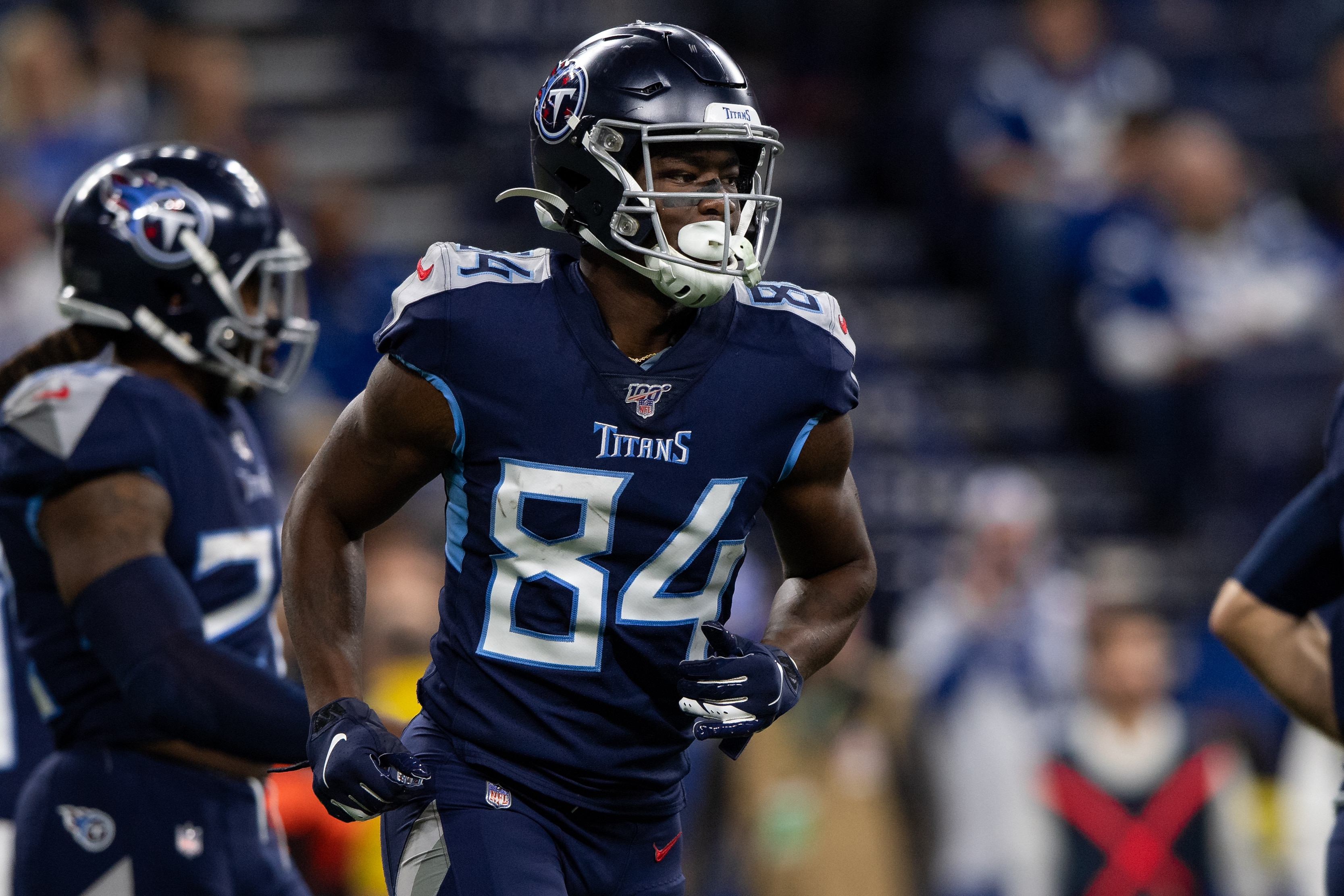INDIANAPOLIS, IN - DECEMBER 01: Tennessee Titans wide receiver Corey Davis (84) runs to the sidelines during the NFL game between the Tennessee Titans and the Indianapolis Colts on December 1, 2019 at Lucas Oil Stadium, in Indianapolis, IN. (Photo by Zach Bolinger/Icon Sportswire via Getty Images)
