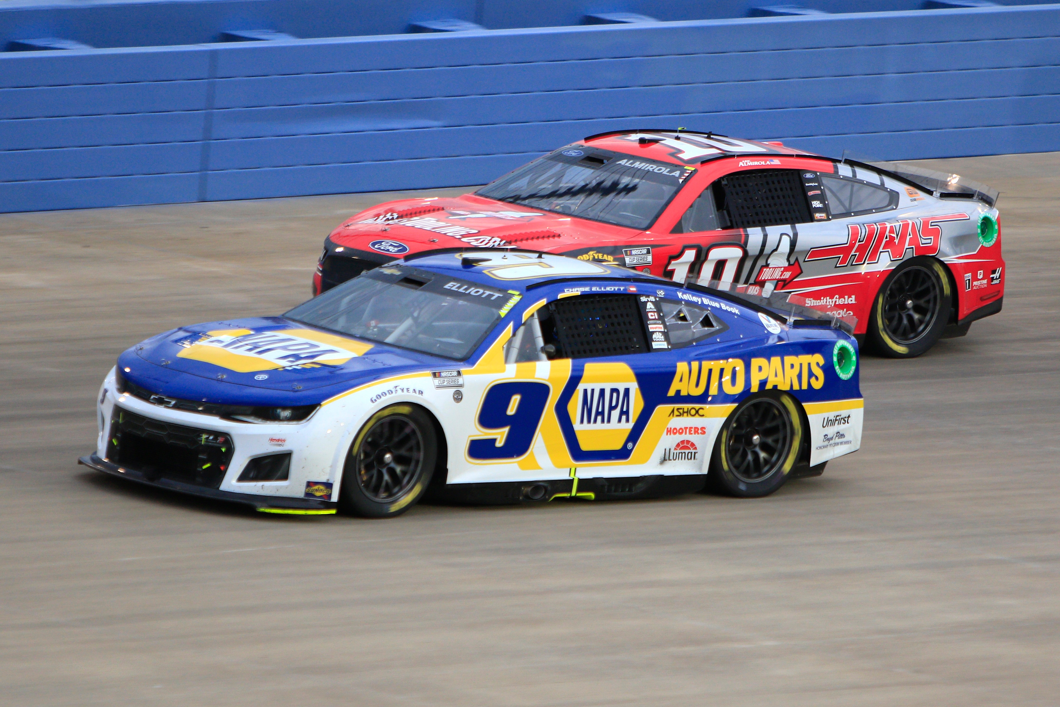 NASHVILLE, TN - JUNE 26: Chase Elliott (#9 Hendrick Motorsports NAPA Auto Parts Chevrolet) races with Aric Almirola (#10 Stewart Haas Racing Hass Automation Ford) during the running of the 2nd annual NASCAR Cup Series Ally 400 on June 26, 2022 at Nashville SuperSpeedway in Nashville, TN. (Photo by Jeff Robinson/Icon Sportswire via Getty Images)