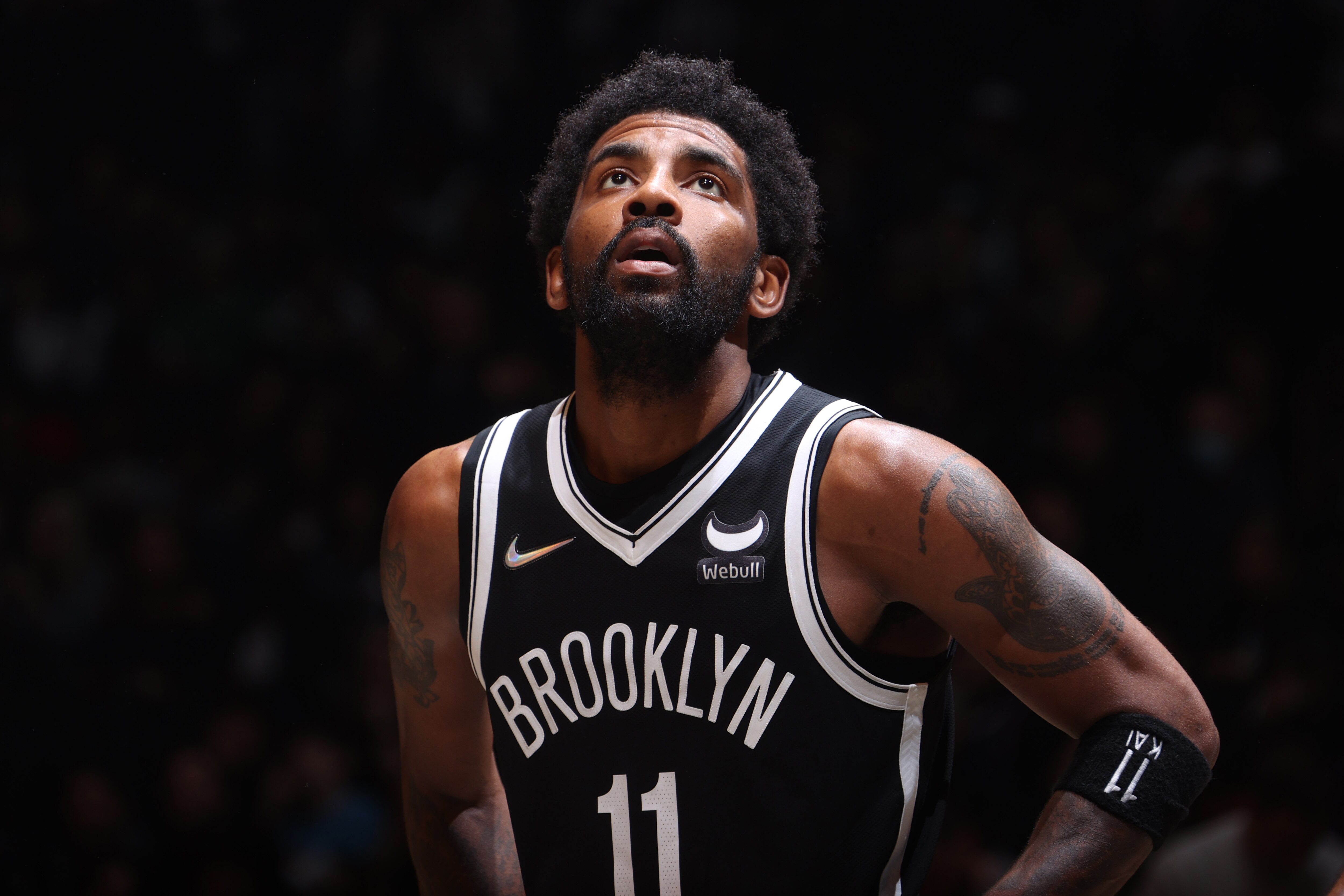 BROOKLYN, NY - APRIL 23: Kyrie Irving #11 of the Brooklyn Nets looks on against the Boston Celtics during Round 1 Game 3 of the 2022 NBA Playoffs on April 23, 2022 at Barclays Center in Brooklyn, New York. NOTE TO USER: User expressly acknowledges and agrees that, by downloading and or using this Photograph, user is consenting to the terms and conditions of the Getty Images License Agreement. Mandatory Copyright Notice: Copyright 2022 NBAE (Photo by Nathaniel S. Butler/NBAE via Getty Images)