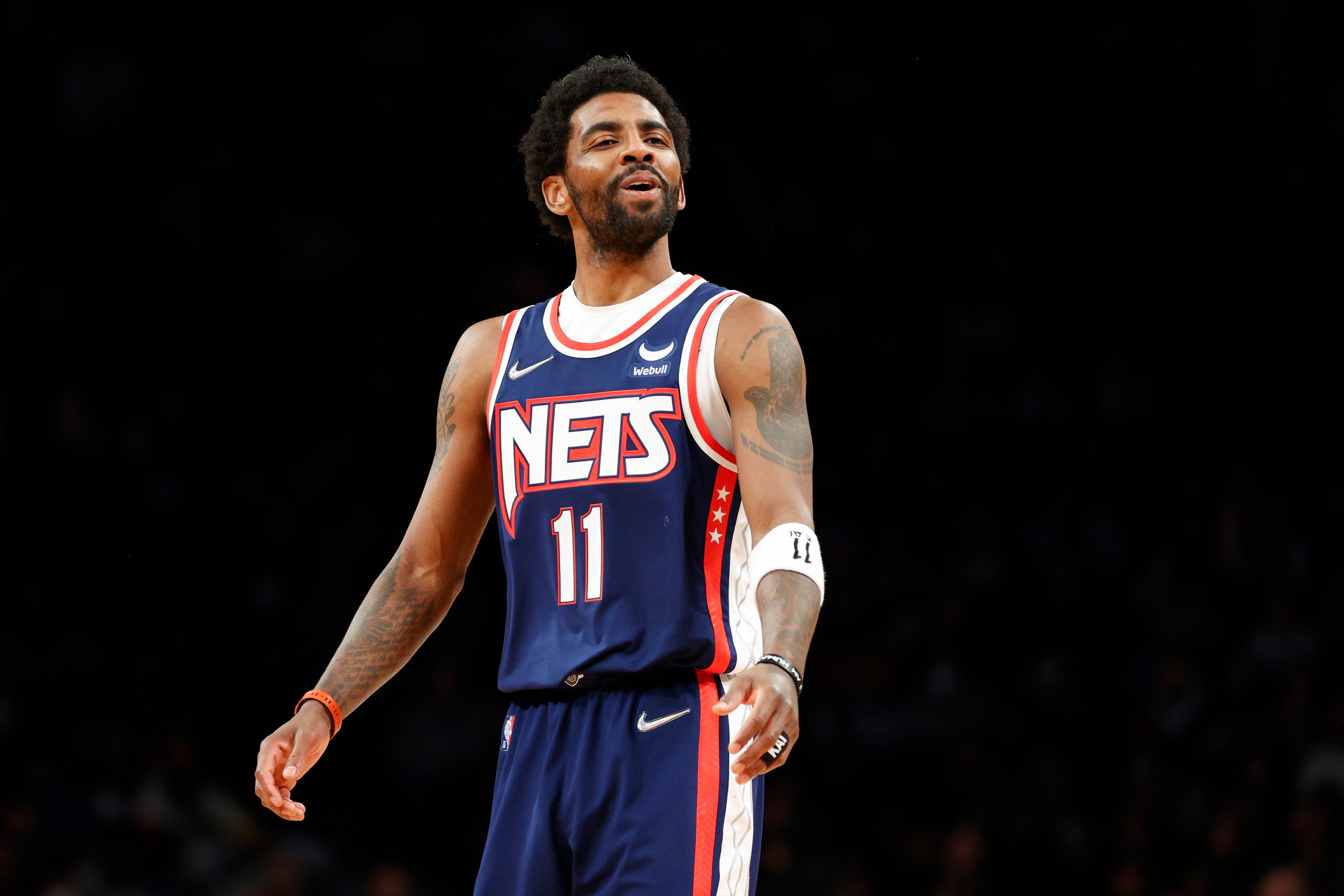 NEW YORK, NEW YORK - APRIL 10: Kyrie Irving #11 of the Brooklyn Nets reacts during the first half against the Indiana Pacers at Barclays Center on April 10, 2022 in the Brooklyn borough of New York City. NOTE TO USER: User expressly acknowledges and agrees that, by downloading and or using this photograph, User is consenting to the terms and conditions of the Getty Images License Agreement. (Photo by Sarah Stier/Getty Images)