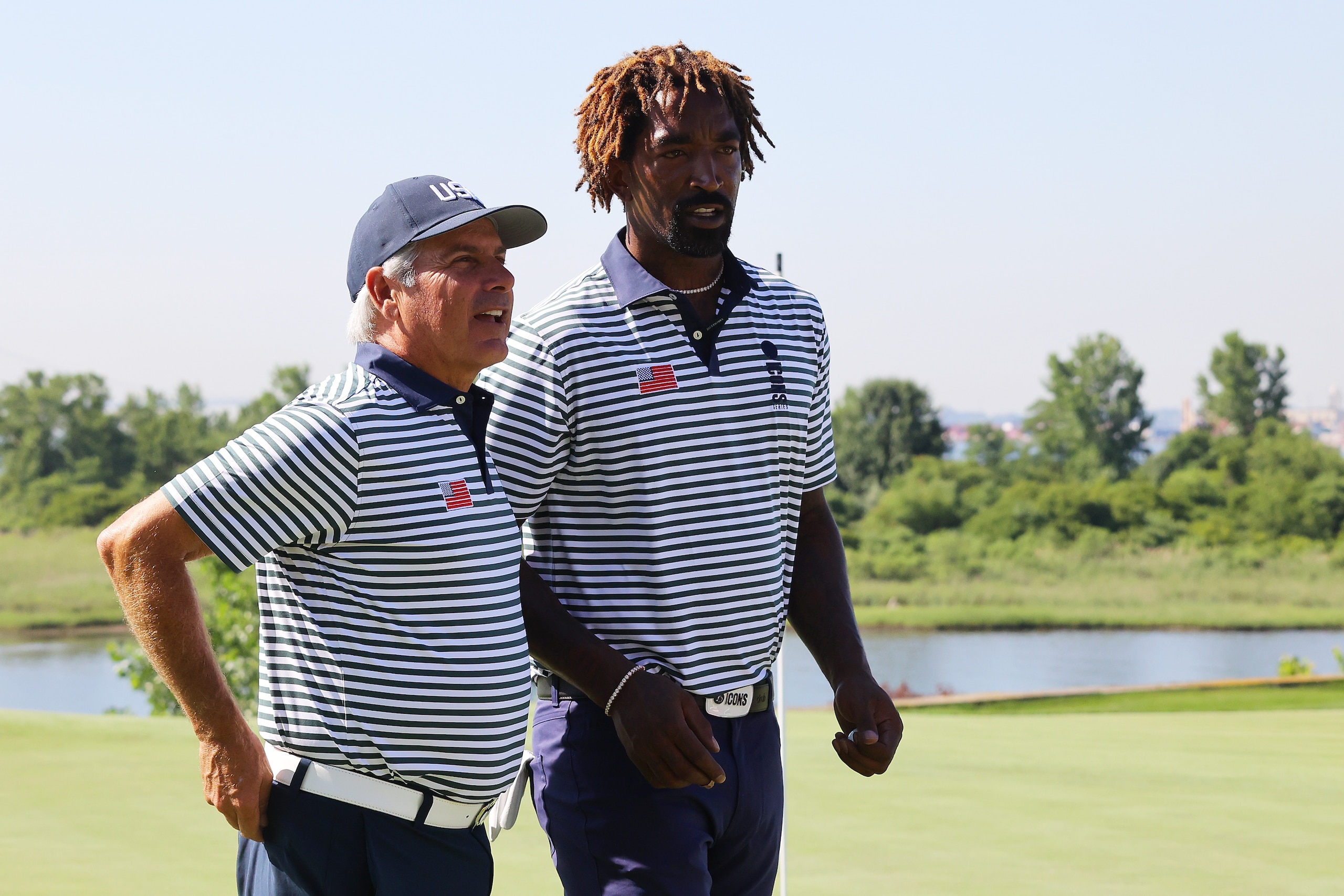 JERSEY CITY, NEW JERSEY - JUNE 30: JR Smith and Fred Couples talk during day one of the ICON Series at Liberty National Golf Club on June 30, 2022 in Jersey City, New Jersey. (Photo by Mike Stobe/Getty Images)