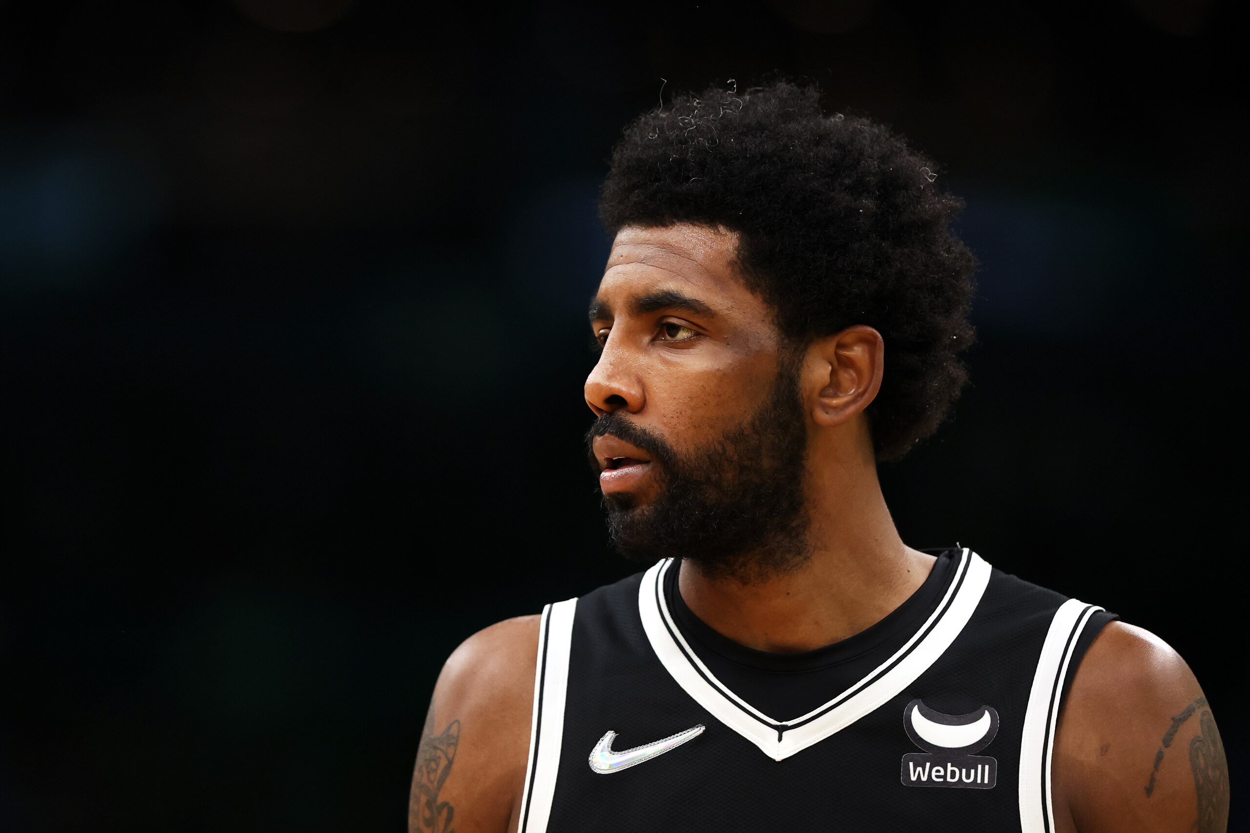 BOSTON, MASSACHUSETTS - APRIL 20: Kyrie Irving #11 of the Brooklyn Nets looks on during the second quarter of Game Two of the Eastern Conference First Round NBA Playoffs against the Boston Celtics at TD Garden on April 20, 2022 in Boston, Massachusetts. (Photo by Maddie Meyer/Getty Images) BOSTON, MASSACHUSETTS - APRIL 20: Kyrie Irving #11 of the Brooklyn Nets looks on during the second quarter of Game Two of the Eastern Conference First Round NBA Playoffs against the Boston Celtics at TD Garden on April 20, 2022 in Boston, Massachusetts. (Photo by Maddie Meyer/Getty Images)