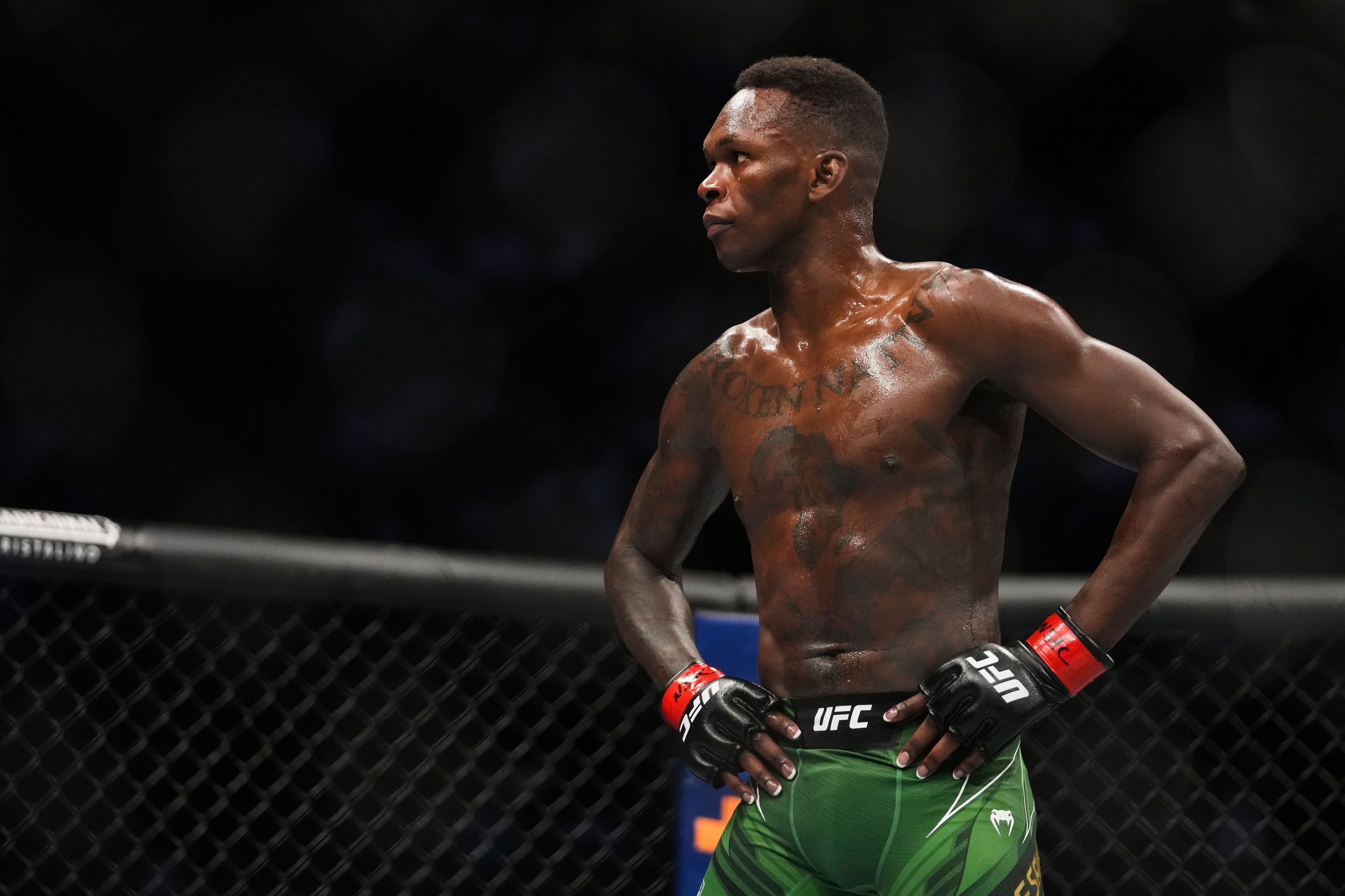 LAS VEGAS, NEVADA - JULY 02: Israel Adesanya of Nigeria waits for the start of the round in the UFC middleweight championship fight during the UFC 276 event at T-Mobile Arena on July 02, 2022 in Las Vegas, Nevada. (Photo by Cooper Neill/Zuffa LLC)
