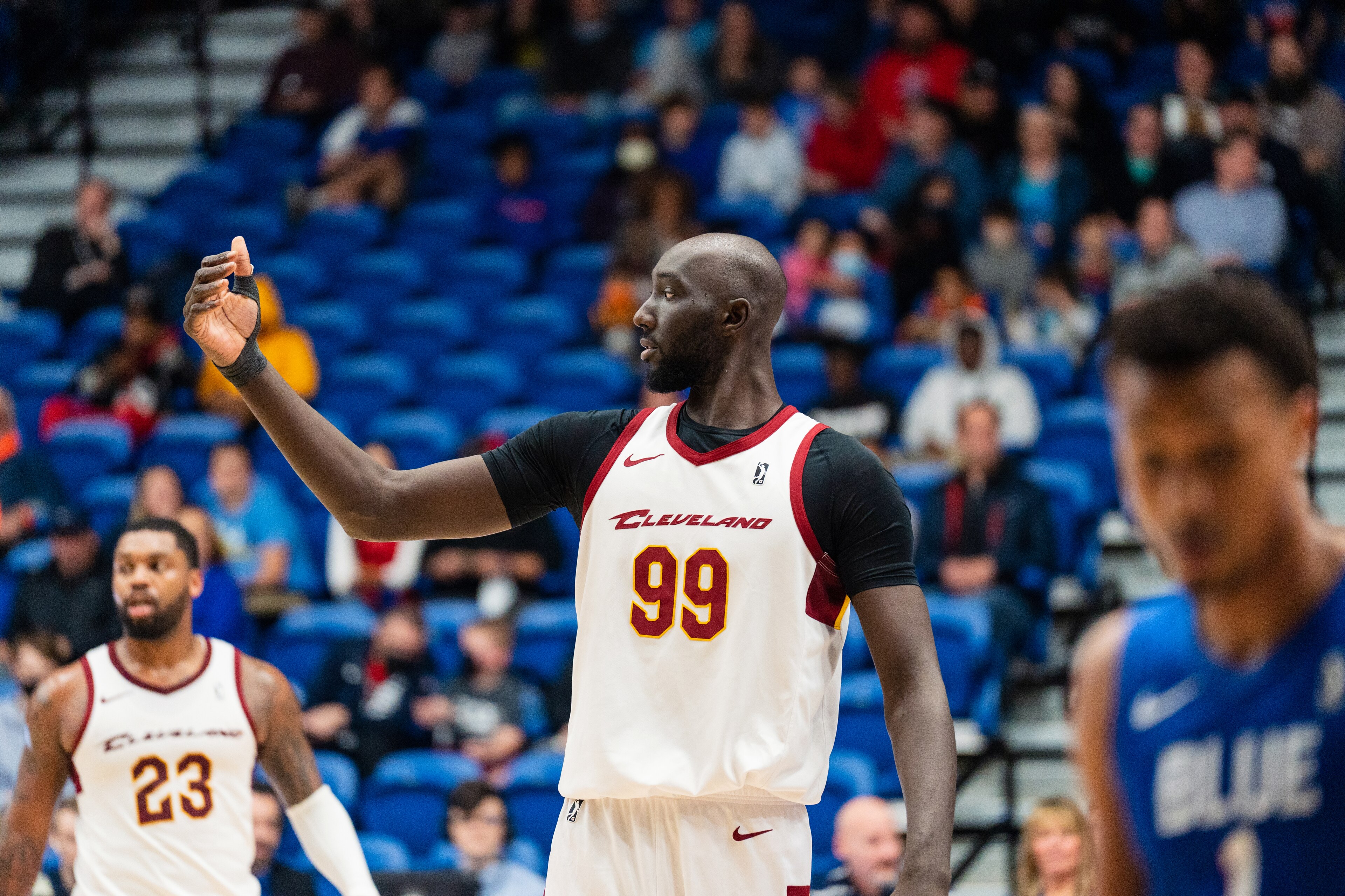 WILMINGTON, DE - MARCH 25: Tacko Fall #99 of the Cleveland Charge talks to teammates during a game against the Delaware Blue Coats on March 25, 2022 at Chase Fieldhouse in Wilmington, Delaware. NOTE TO USER: User expressly acknowledges and agrees that, by downloading and/or using this Photograph, user is consenting to the terms and conditions of the Getty Images License Agreement. Mandatory Copyright Notice: Copyright 2022 NBAE (Photo by Mary Kate Ridgway/NBAE via Getty Images) WILMINGTON, DE - MARCH 25: Tacko Fall #99 of the Cleveland Charge talks to teammates during a game against the Delaware Blue Coats on March 25, 2022 at Chase Fieldhouse in Wilmington, Delaware. NOTE TO USER: User expressly acknowledges and agrees that, by downloading and/or using this Photograph, user is consenting to the terms and conditions of the Getty Images License Agreement. Mandatory Copyright Notice: Copyright 2022 NBAE (Photo by Mary Kate Ridgway/NBAE via Getty Images)