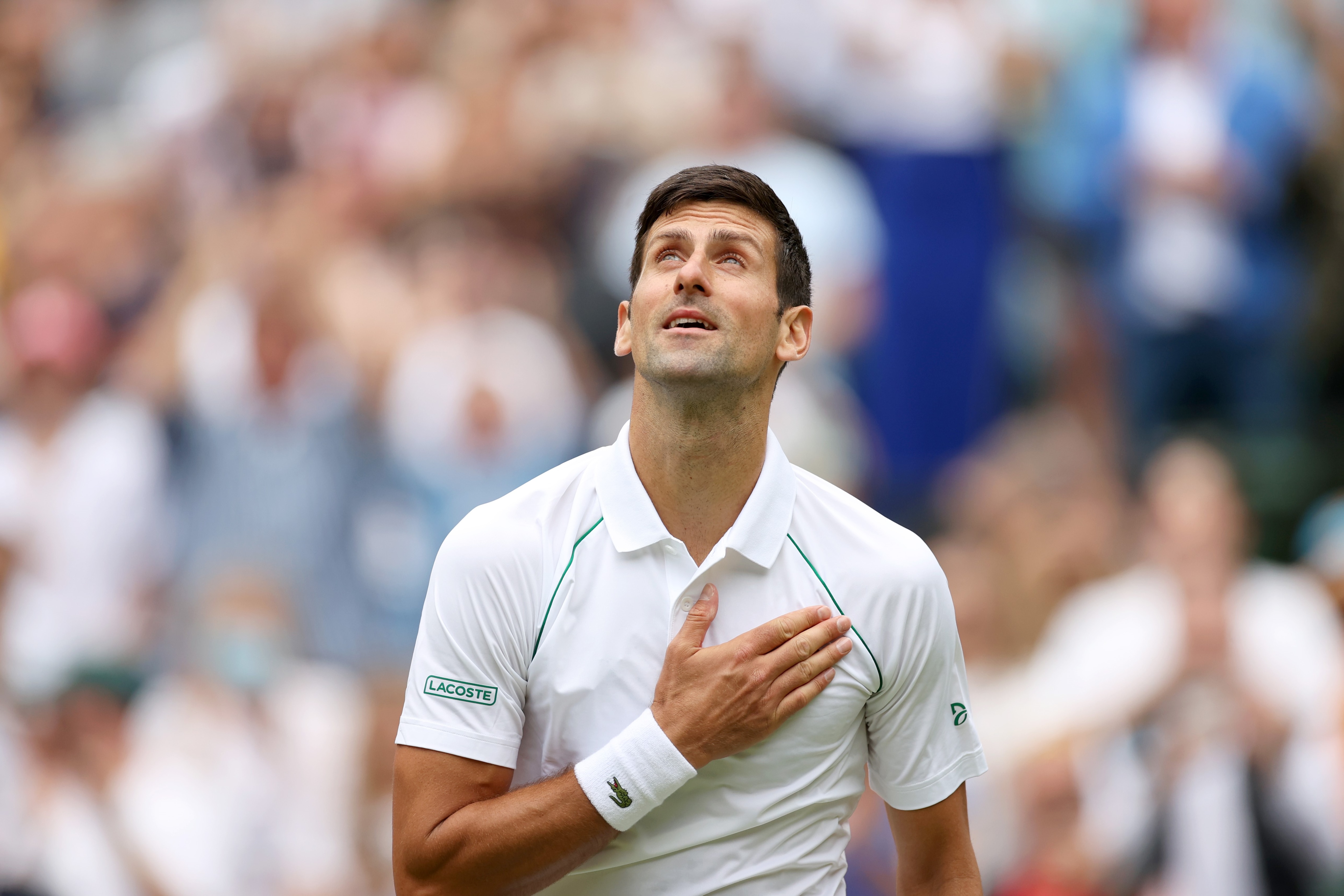 Novak Djokovic celebrates victory after winning the men's singles third round match between Novak Djokovic of Serbia and Miomir Kecmanovic of Serbia at Wimbledon Tennis Championship in London, Britain, on July 1, 2022. (Photo by Li Ying/Xinhua via Getty Images)