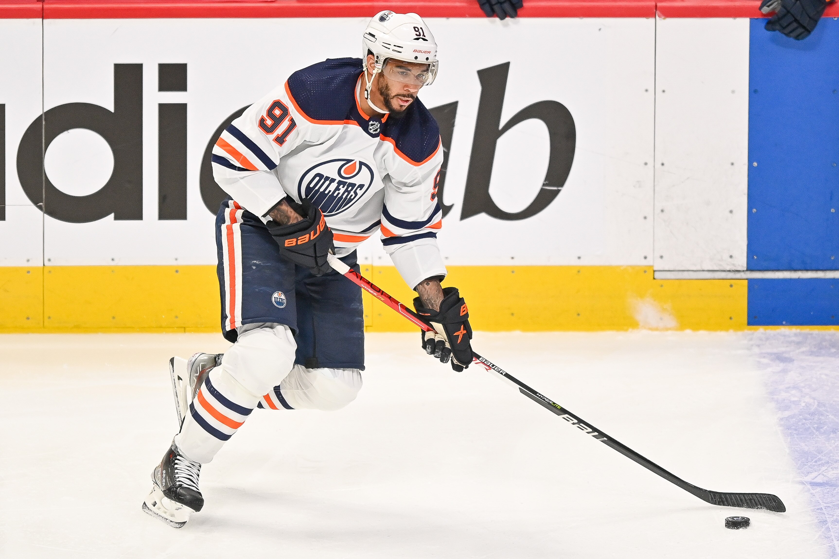 DENVER, CO - MAY 31: Edmonton Oilers left wing Evander Kane (91) skates with the puck during a Stanley Cup Playoffs Western Conference Finals game between the Edmonton Oilers and the Colorado Avalanche at Ball Arena in Denver, Colorado on May 31, 2022. (Photo by Dustin Bradford/Icon Sportswire via Getty Images)