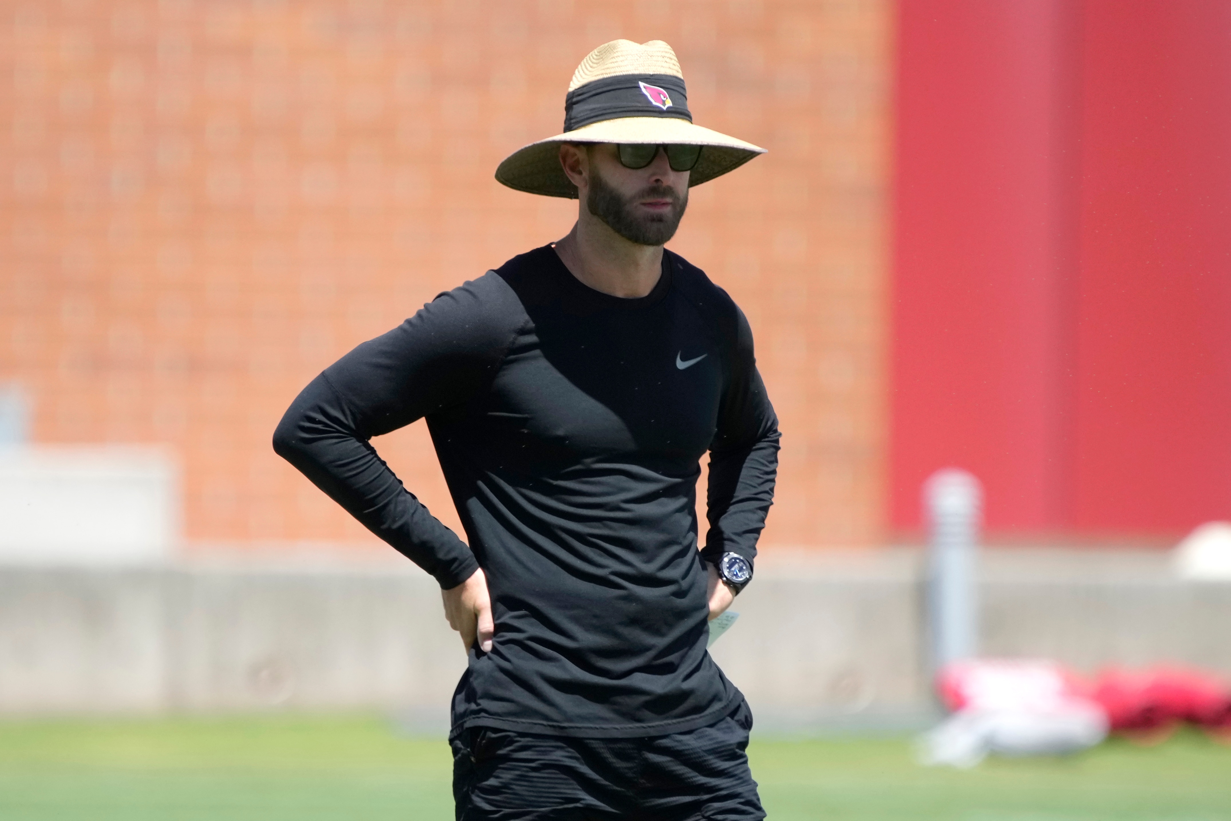 Arizona Cardinals head coach Kliff Kingsbury watches drills at the NFL football team's practice facility, Monday, May 23, 2022, in Tempe, Ariz. (AP Photo/Rick Scuteri)
