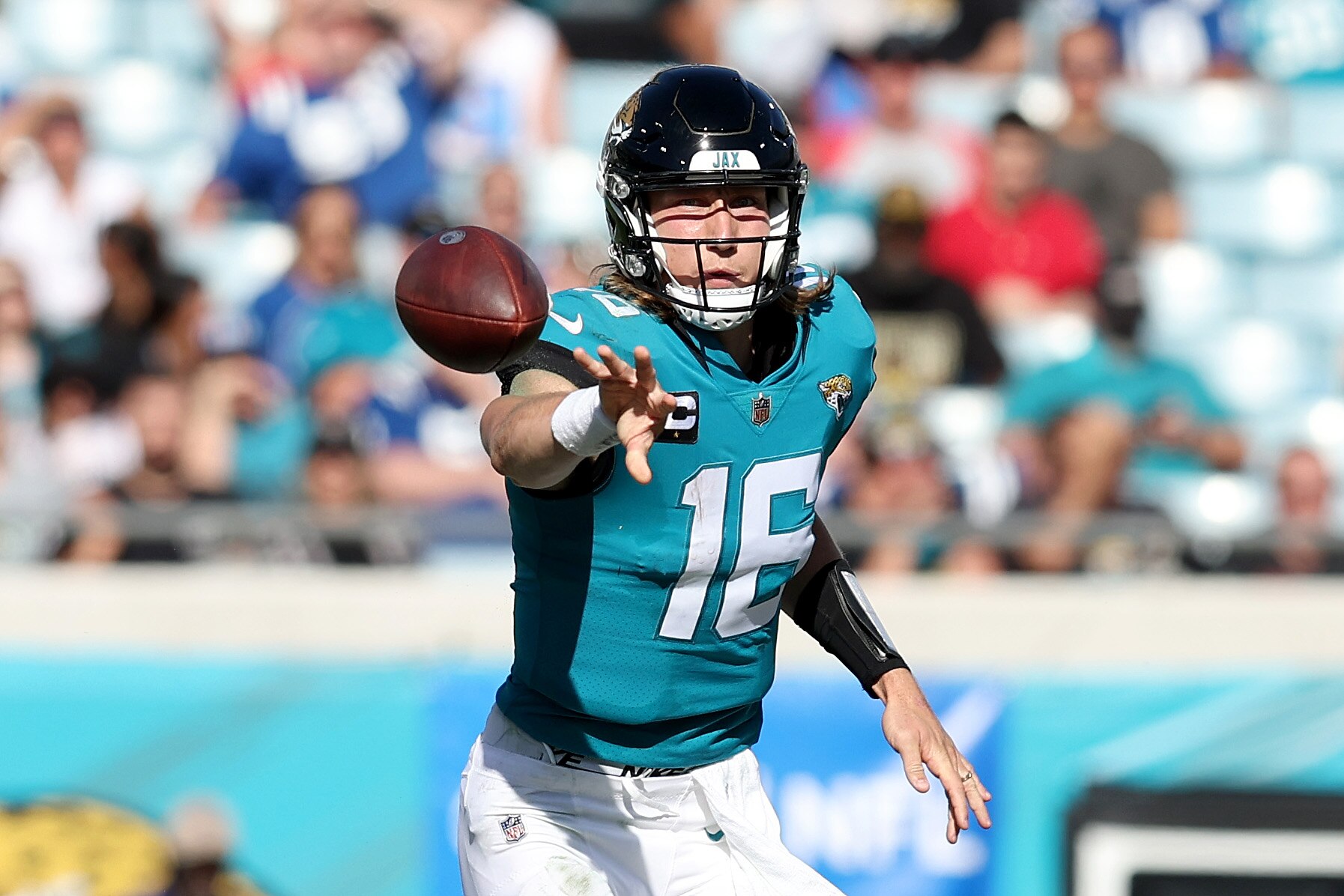 JACKSONVILLE, FLORIDA - JANUARY 09: Trevor Lawrence #16 of the Jacksonville Jaguars attempts a pass during the game against the Indianapolis Colts at TIAA Bank Field on January 09, 2022 in Jacksonville, Florida. (Photo by Sam Greenwood/Getty Images)