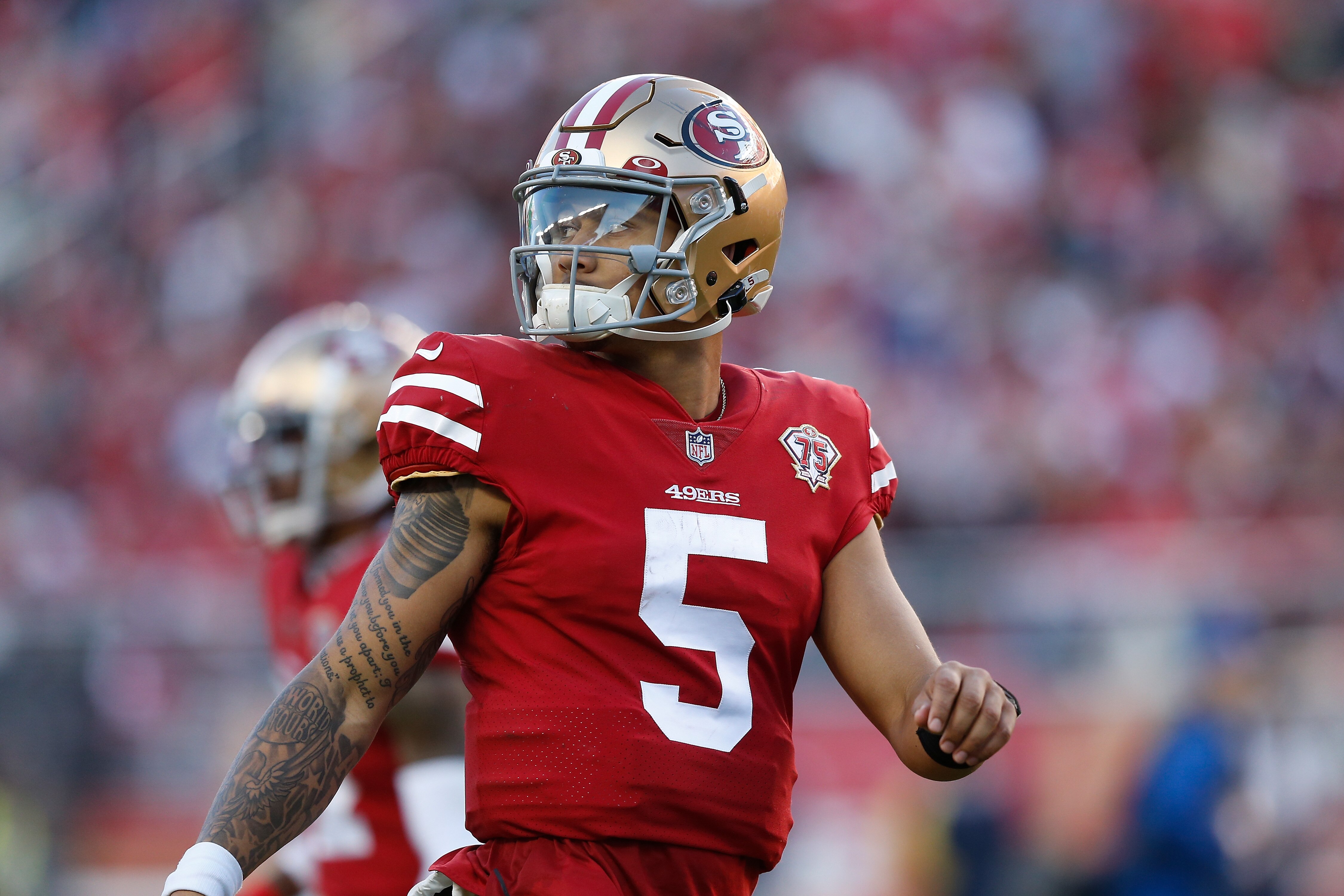 SANTA CLARA, CALIFORNIA - JANUARY 02: Trey Lance #5 of the San Francisco 49ers looks on in the fourth quarter against the Houston Texans at Levi's Stadium on January 02, 2022 in Santa Clara, California. (Photo by Lachlan Cunningham/Getty Images)