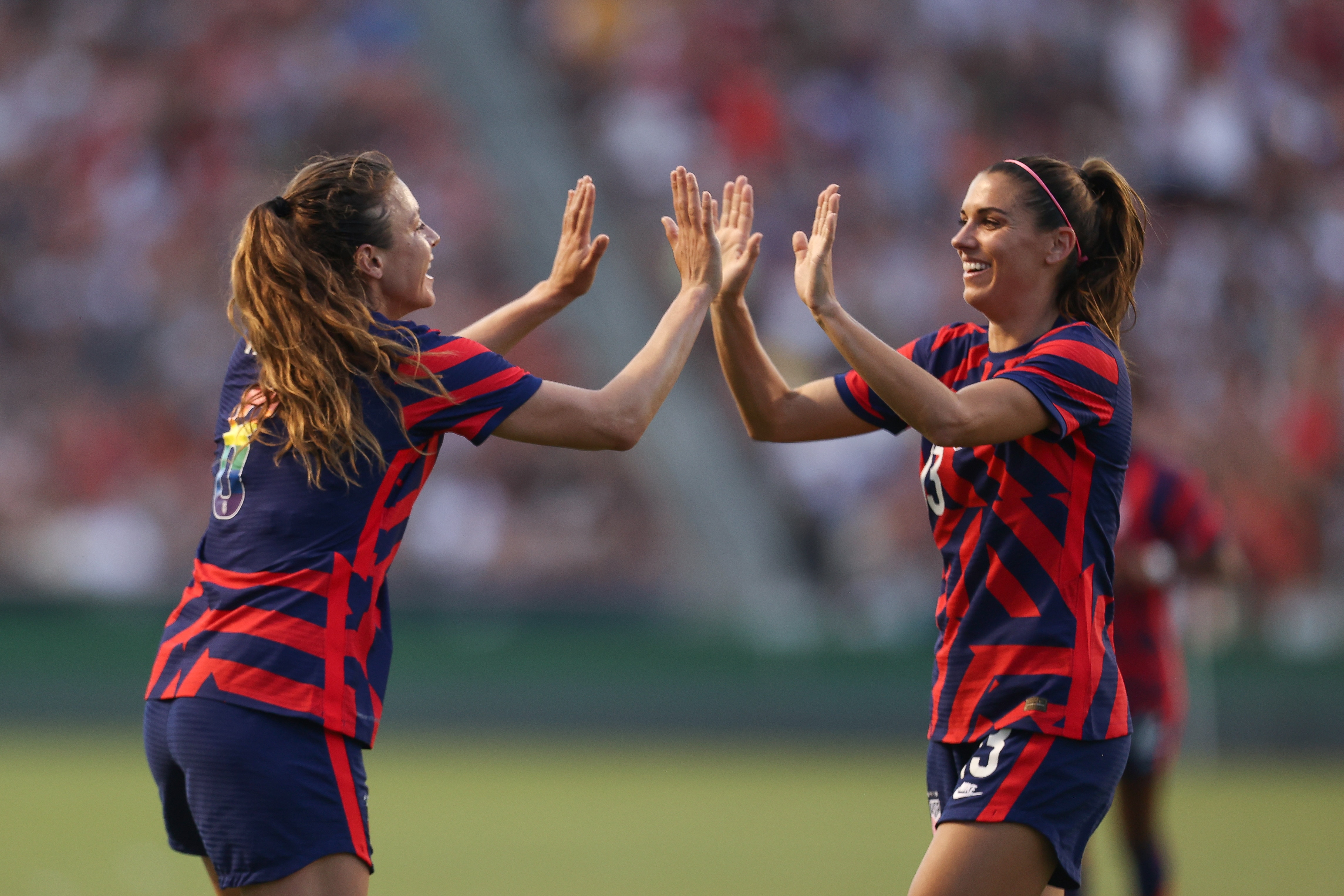 SANDY, UT - JUNE 28: Sofia Huerta #8 and Alex Morgan #13 of United States celebrate an own goal in her favor during the friendly game between Colombia and United States at Rio Tinto Stadium on June 28, 2022 in Sandy, Utah. (Photo by Omar Vega/Getty Images)