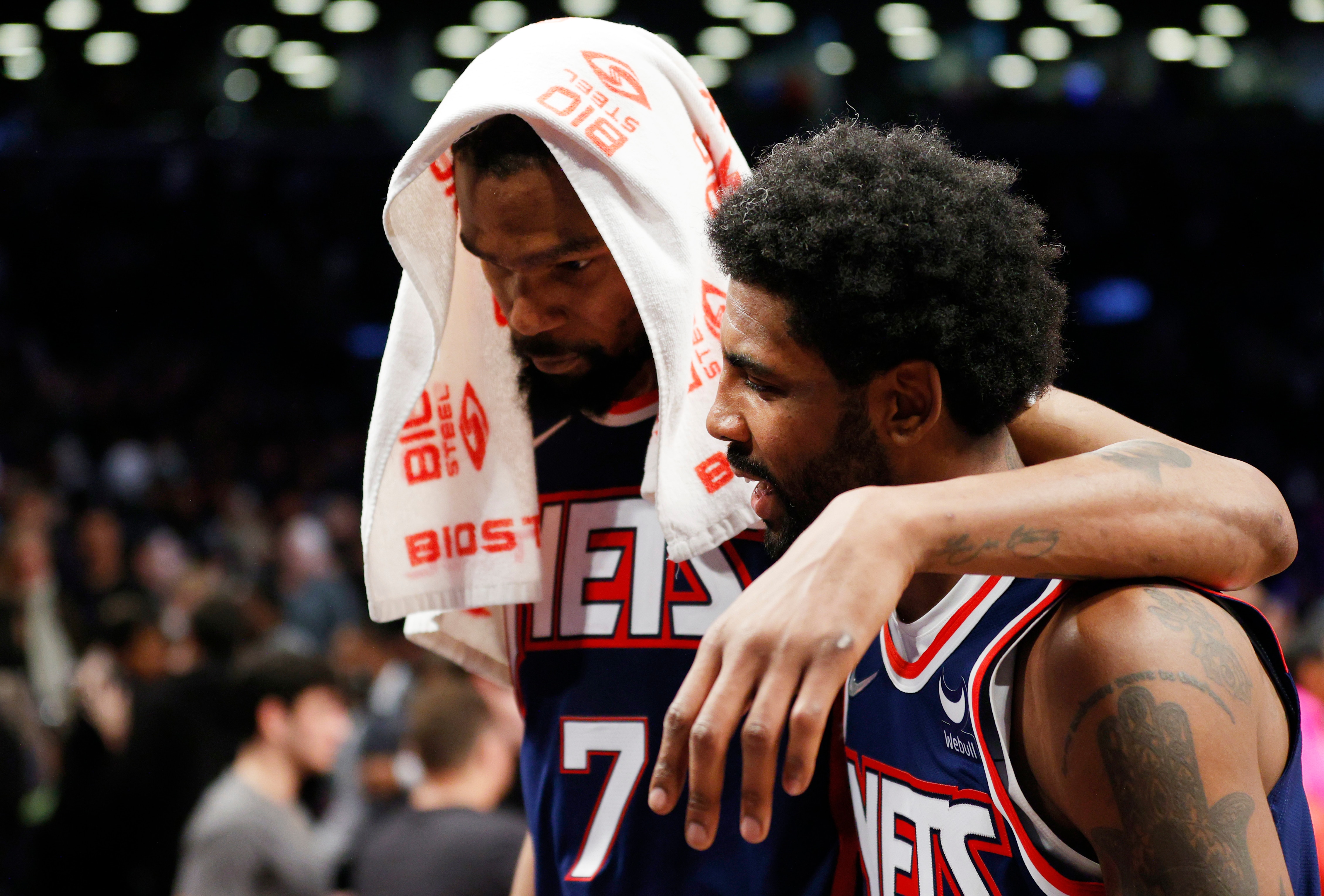 NEW YORK, NEW YORK - APRIL 08: Kevin Durant #7 talks with Kyrie Irving #11 of the Brooklyn Nets after the second half against the Cleveland Cavaliers at Barclays Center on April 08, 2022 in the Brooklyn borough of New York City. The Nets won 118-107. NOTE TO USER: User expressly acknowledges and agrees that, by downloading and or using this photograph, User is consenting to the terms and conditions of the Getty Images License Agreement. (Photo by Sarah Stier/Getty Images)