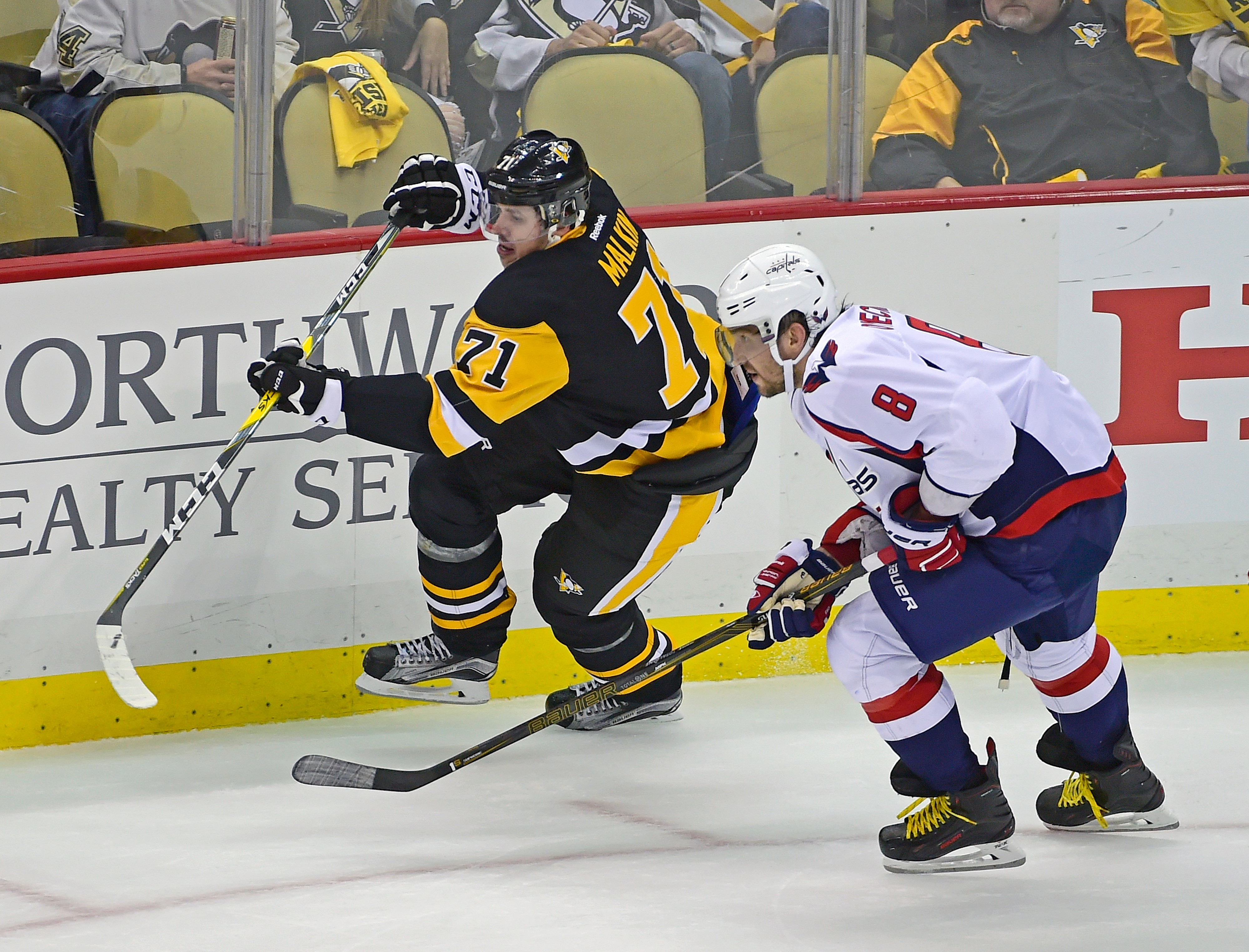 Pittsburgh Penguins center Evgeni Malkin (71) and Washington Capitals left wing Alex Ovechkin (8) skate up the ice during an NHL hockey game a Thursday, Oct. 13, 2016, in Pittsburgh, PA. (AP Photo/Fred Vuich)