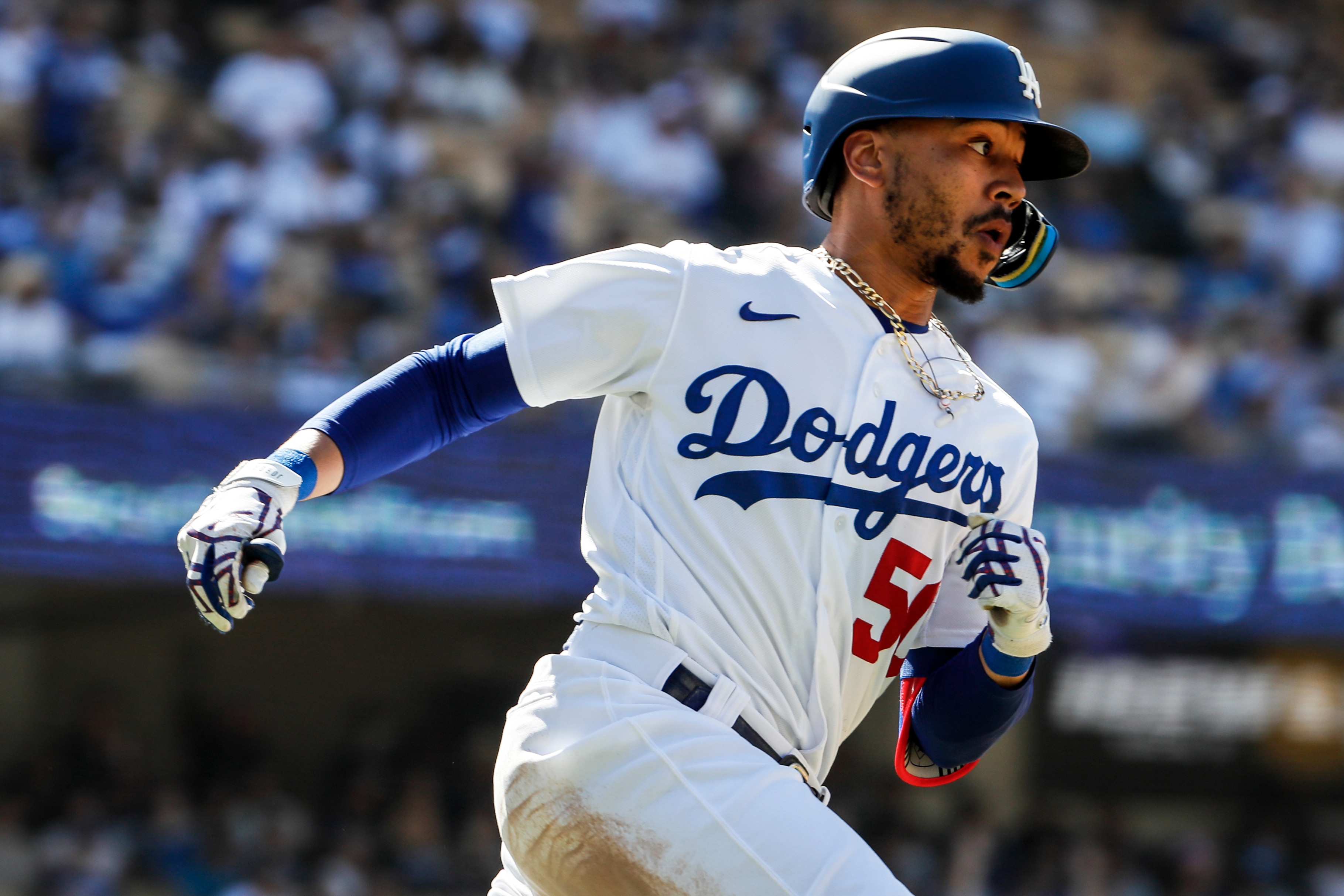 Los Angeles, CA, Sunday, July 3, 2022 - Dodgers right fielder Mookie Betts hits a ninth inning double against the San Diego Padres at Dodger Stadium. (Robert Gauthier/Los Angeles Times via Getty Images)