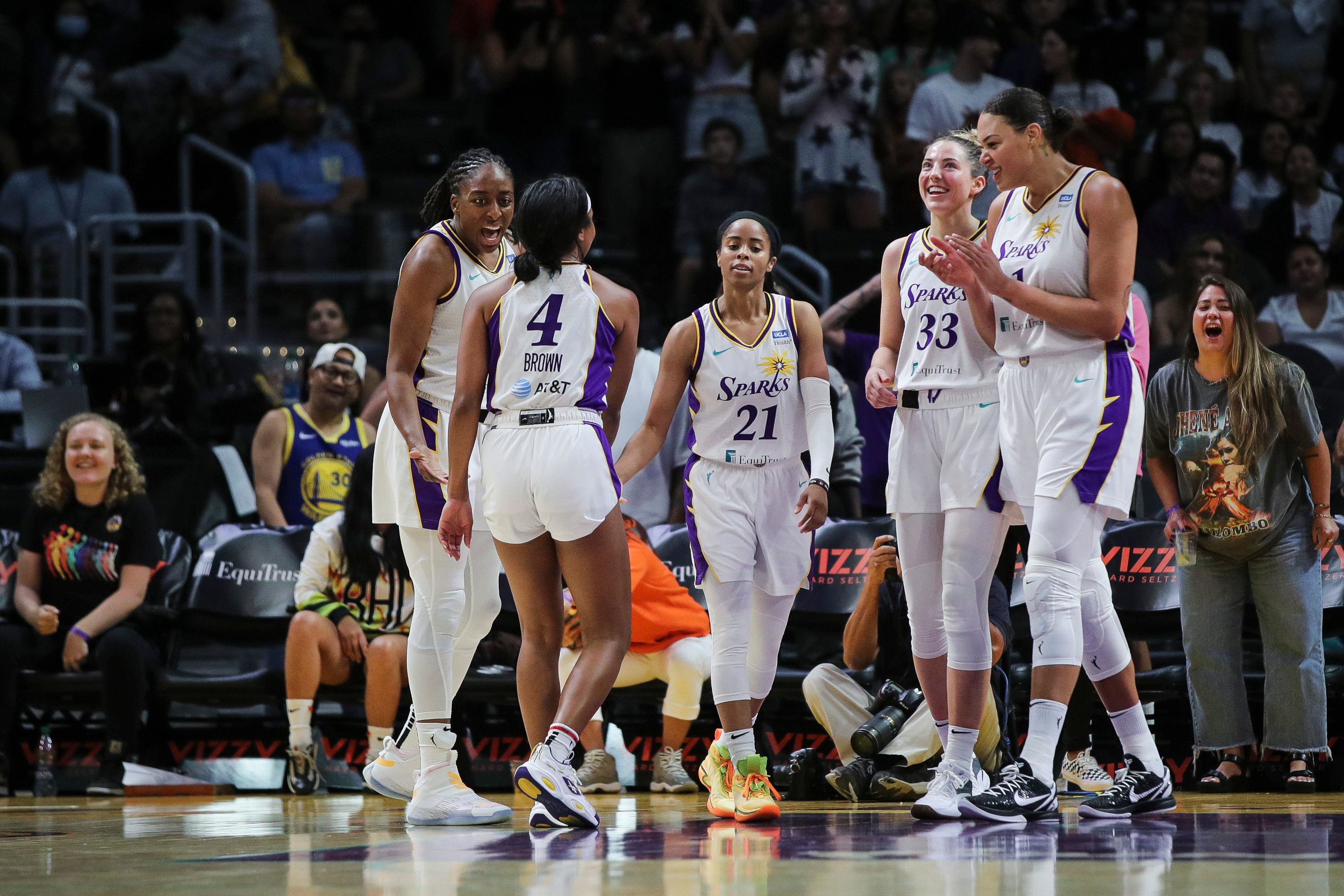 LOS ANGELES, CALIFORNIA - JULY 03: Los Angeles Sparks react to a shot by Jordin Canada #21 in the second half against the New York Liberty at Crypto.com Arena on July 03, 2022 in Los Angeles, California. NOTE TO USER: User expressly acknowledges and agrees that, by downloading and or using this photograph, User is consenting to the terms and conditions of the Getty Images License Agreement. (Photo by Meg Oliphant/Getty Images)