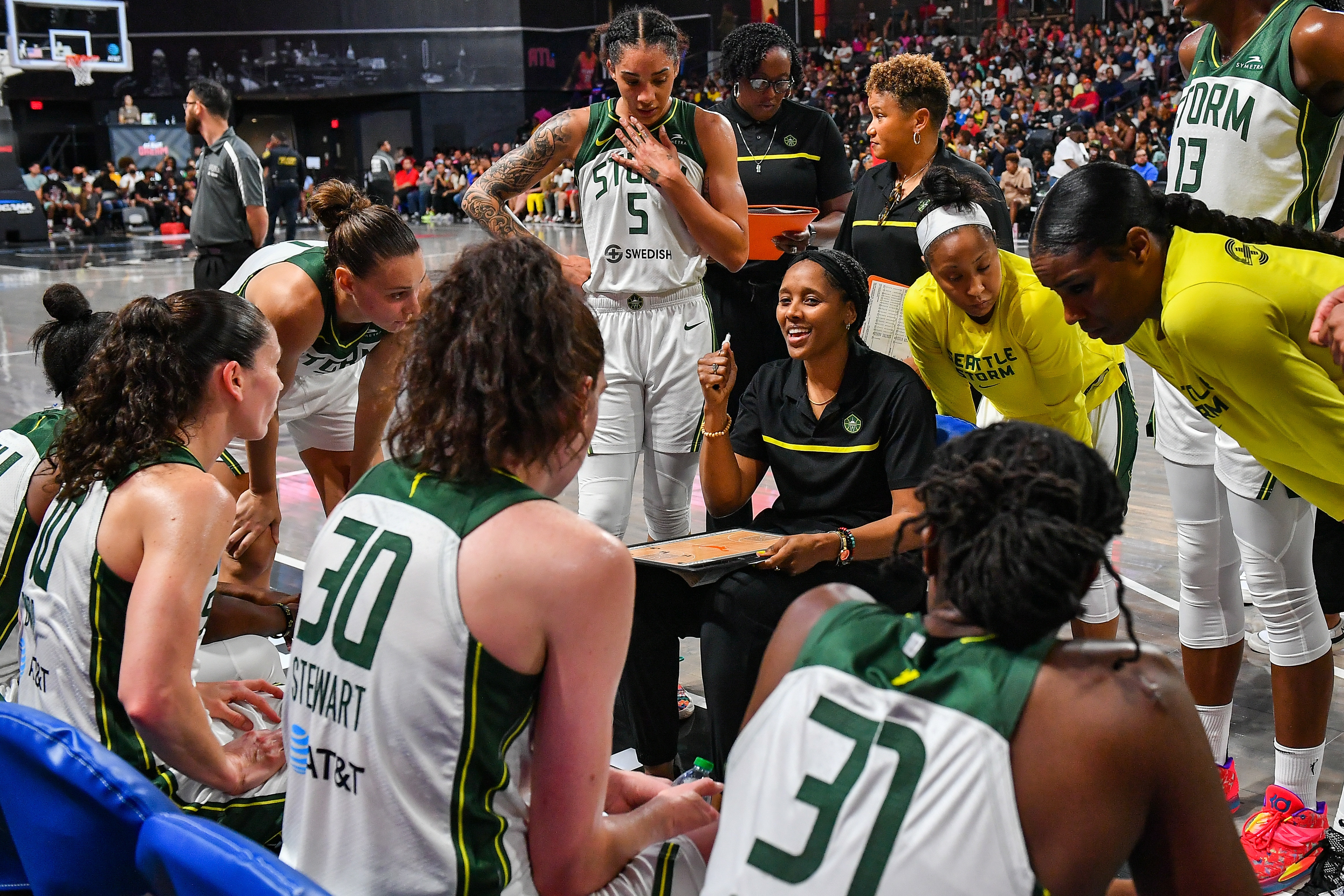 COLLEGE PARK, GA  JULY 03:  Seattle head coach 	Noelle Quinn talks to her team in the huddle during the WNBA game between the Seattle Storm and the Atlanta Dream on July 3rd, 2022 at Gateway Center Arena in College Park, GA. (Photo by Rich von Biberstein/Icon Sportswire via Getty Images)