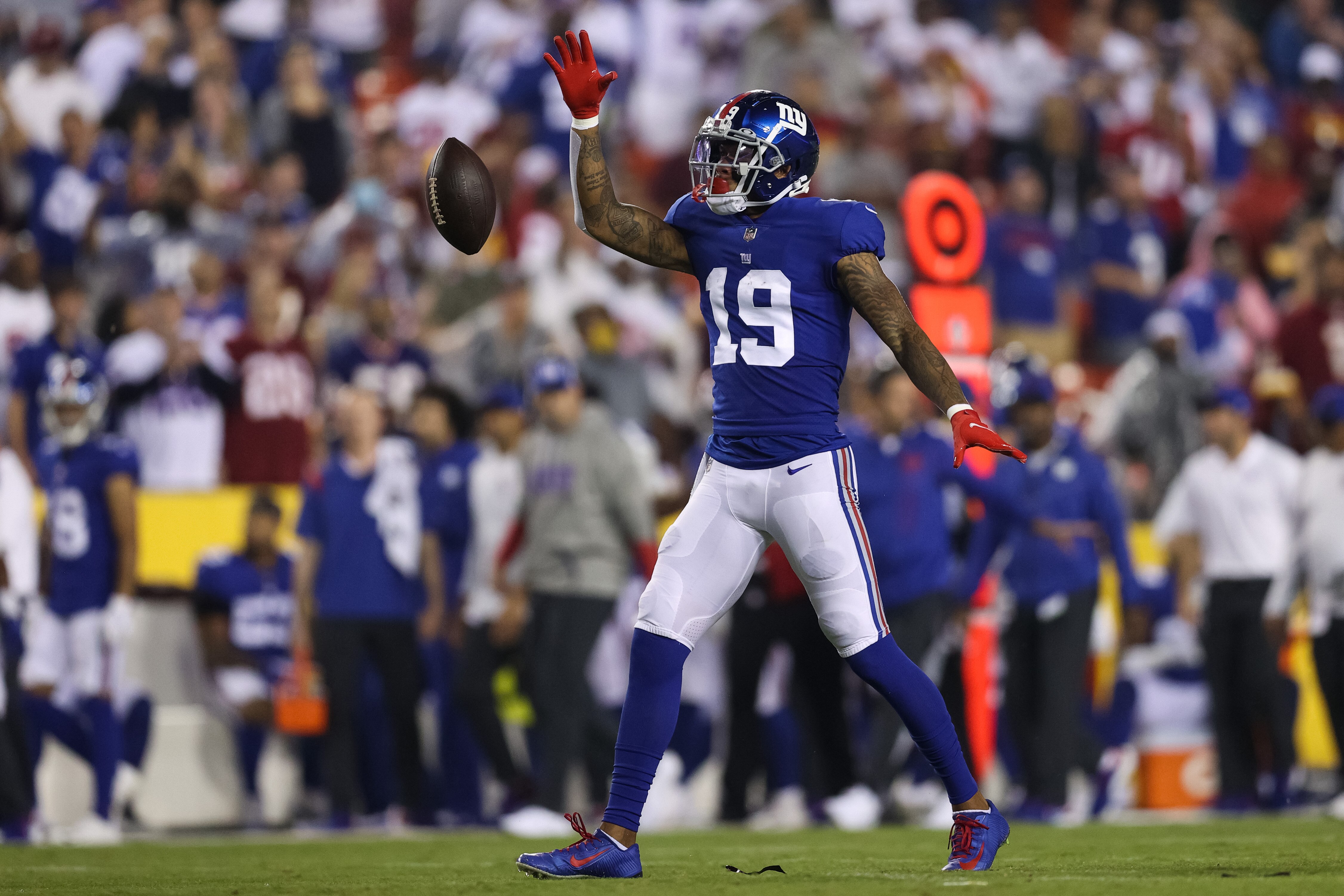 LANDOVER, MARYLAND - SEPTEMBER 16: Kenny Golladay #19 of the New York Giants celebrates a first down during the first quarter against the Washington Football Team at FedExField on September 16, 2021 in Landover, Maryland. (Photo by Patrick Smith/Getty Images)
