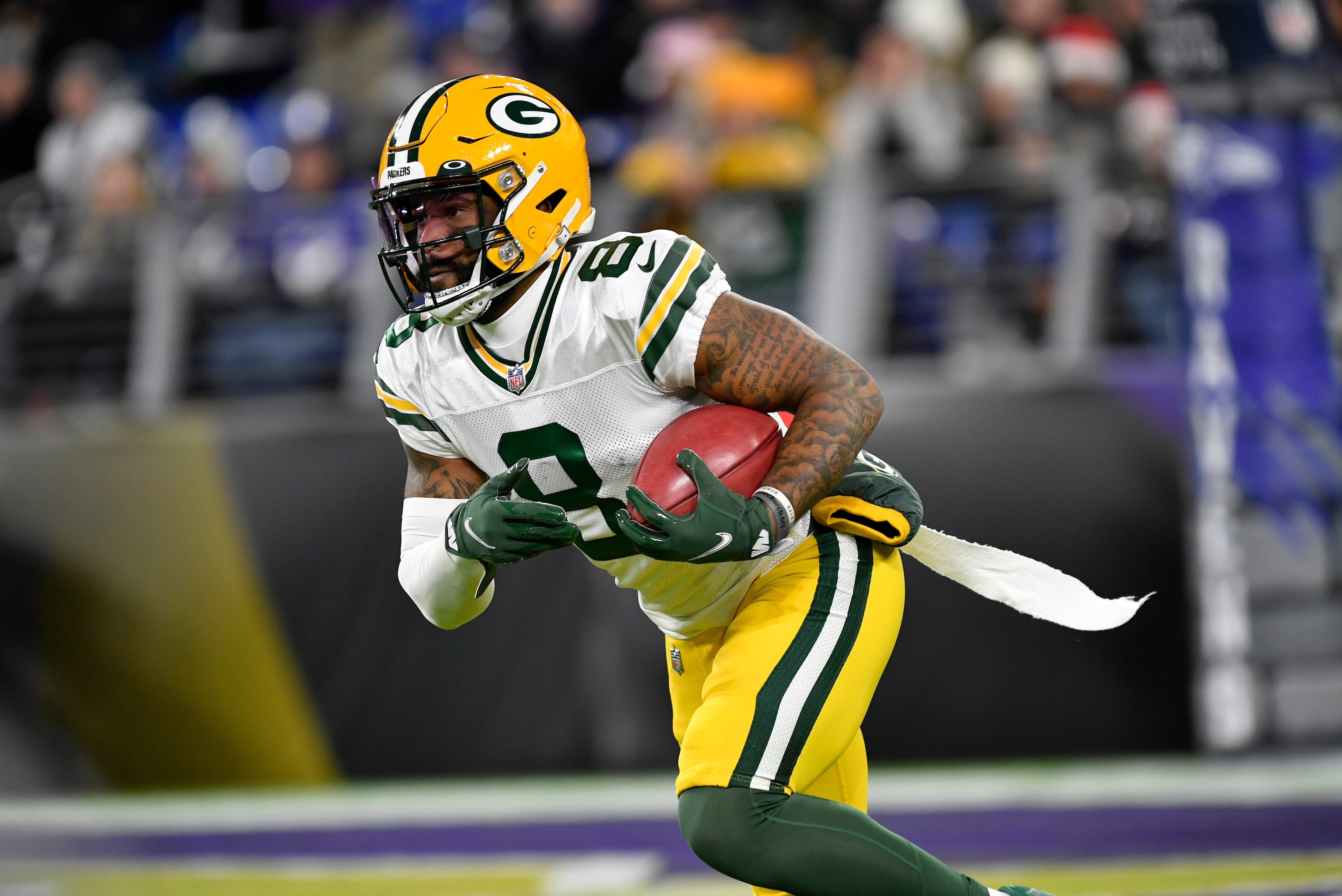 BALTIMORE, MD - DECEMBER 19: Packers wide receiver/punt returner Amari Rodgers (8) returns a kickoff during the Green Bay Packers versus Baltimore Ravens NFL game at M&T Bank Stadium on December 19, 2021 in Baltimore, MD. (Photo by Randy Litzinger/Icon Sportswire via Getty Images)