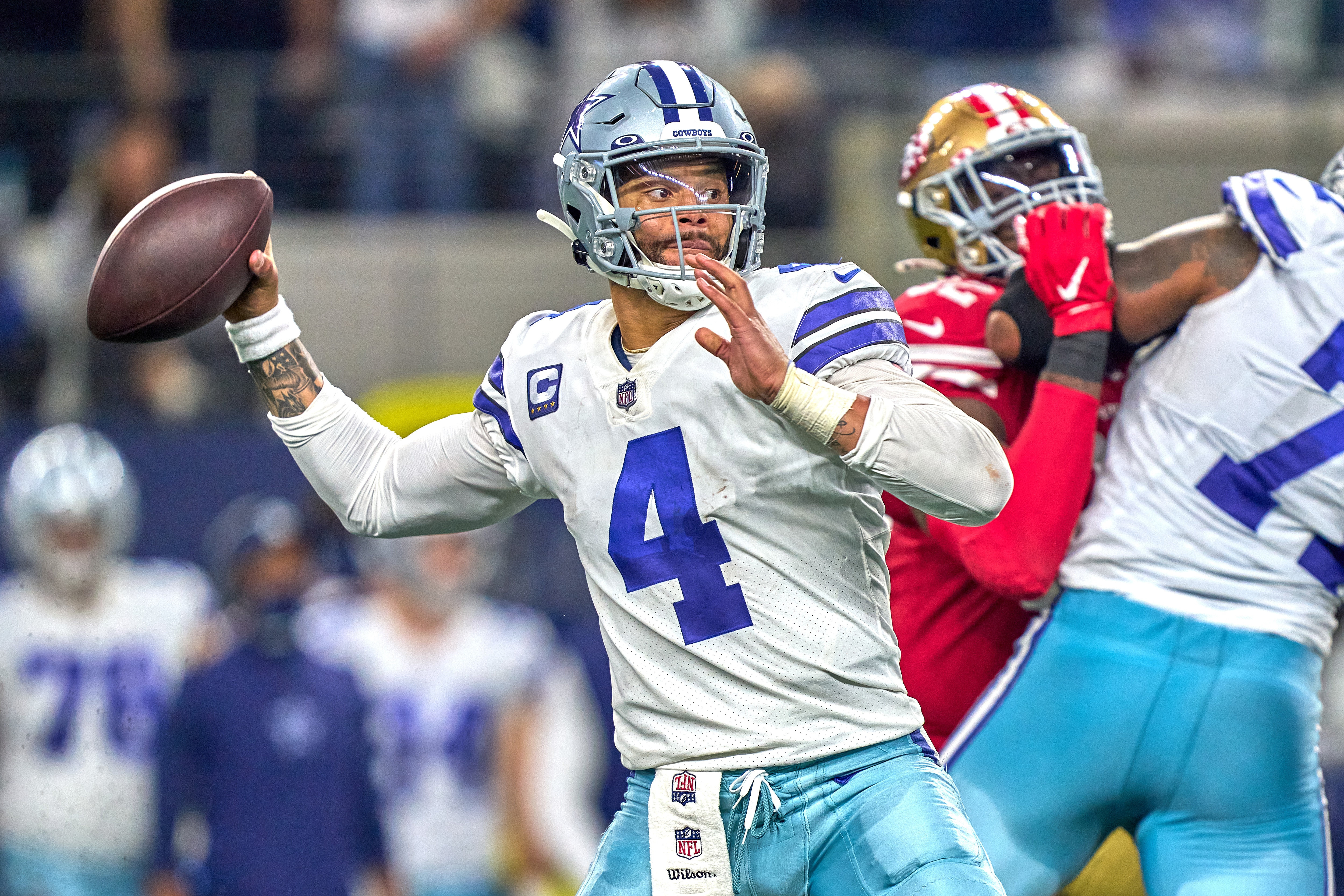 ARLINGTON, TX - JANUARY 16: Dallas Cowboys quarterback Dak Prescott (4) throws the football during the NFC Wild Card game between the San Francisco 49ers and the Dallas Cowboys on January 16, 2022 at AT&T Stadium in Arlington, TX. (Photo by Robin Alam/Icon Sportswire via Getty Images)