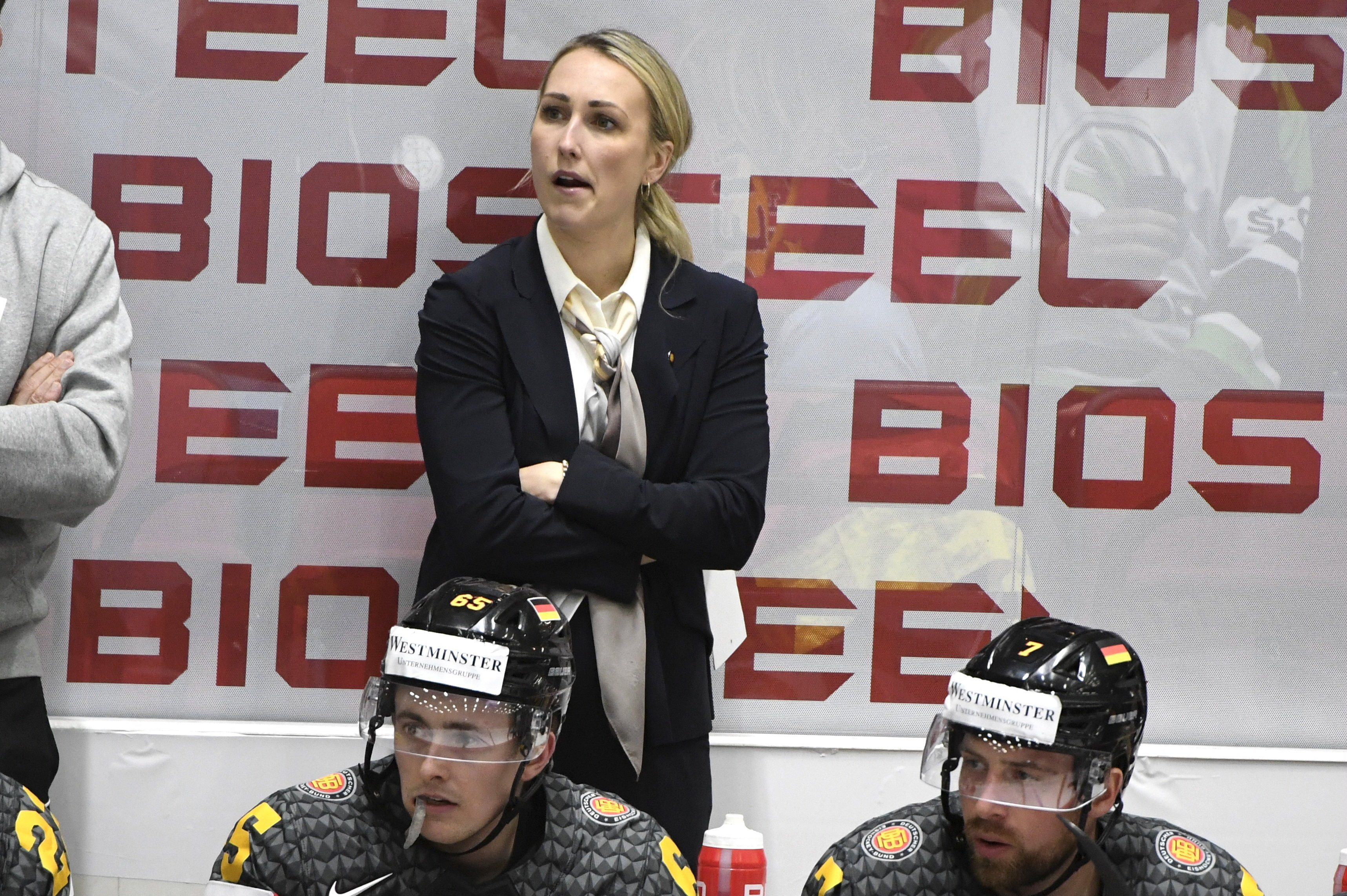 Germany's Canadian Assistant Coach Jessica Campbell follows the action  during the 2022 IIHF Ice Hockey World Championships preliminary round group A match between Germany and Denmark in Helsinki on May 19, 2022. - Finland OUT (Photo by Jussi Nukari / Lehtikuva / AFP) / Finland OUT (Photo by JUSSI NUKARI/Lehtikuva/AFP via Getty Images)