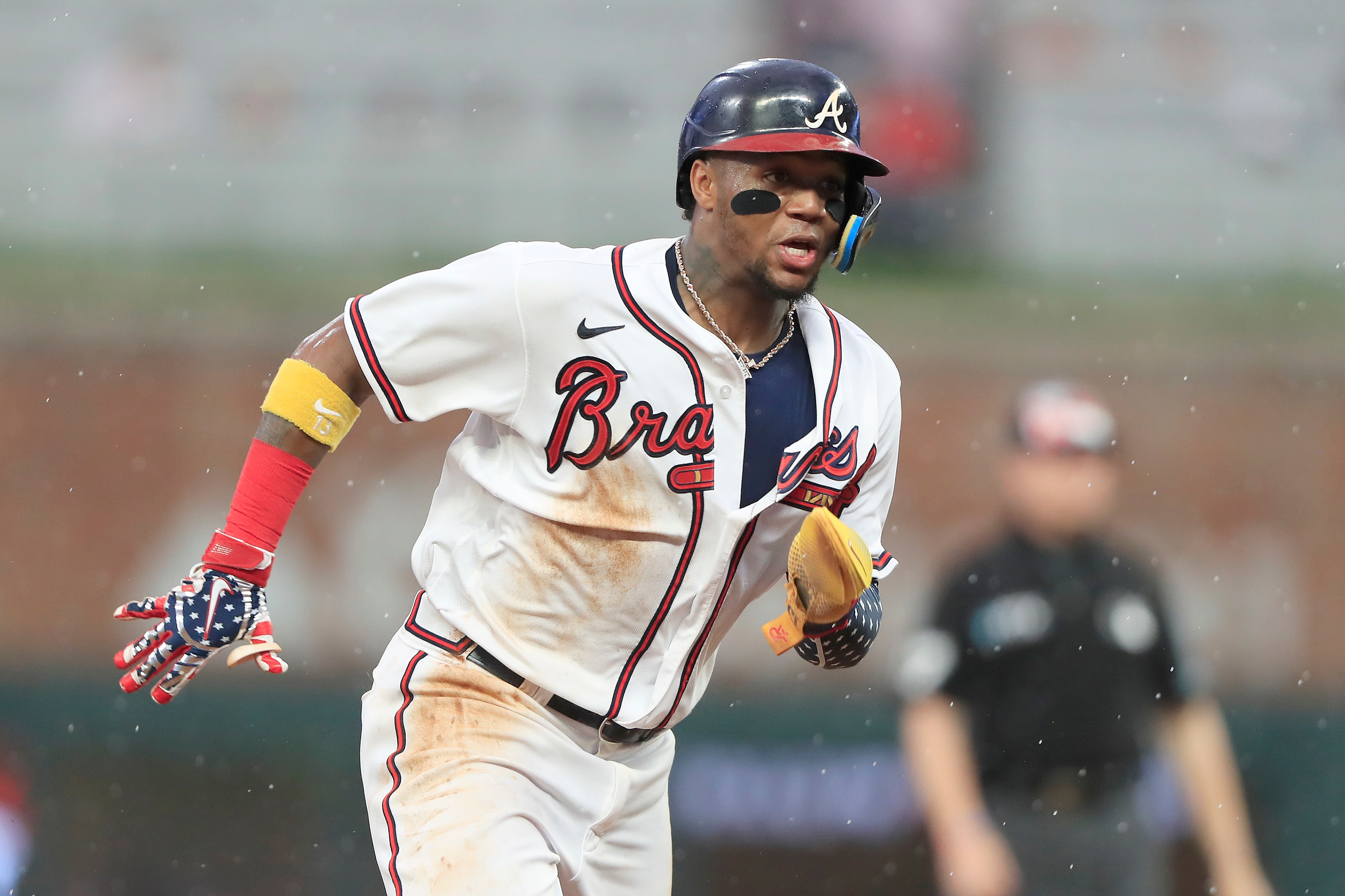 ATLANTA, GA - JULY 04: Ronald Acuna Jr. (13) of the Atlanta Braves heads to third base during the Monday evening MLB game between the Atlanta Braves and the St. Louis Cardinals on July 04, 2022 at Truist Park in Atlanta, Georgia.  (Photo by David J. Griffin/Icon Sportswire via Getty Images)