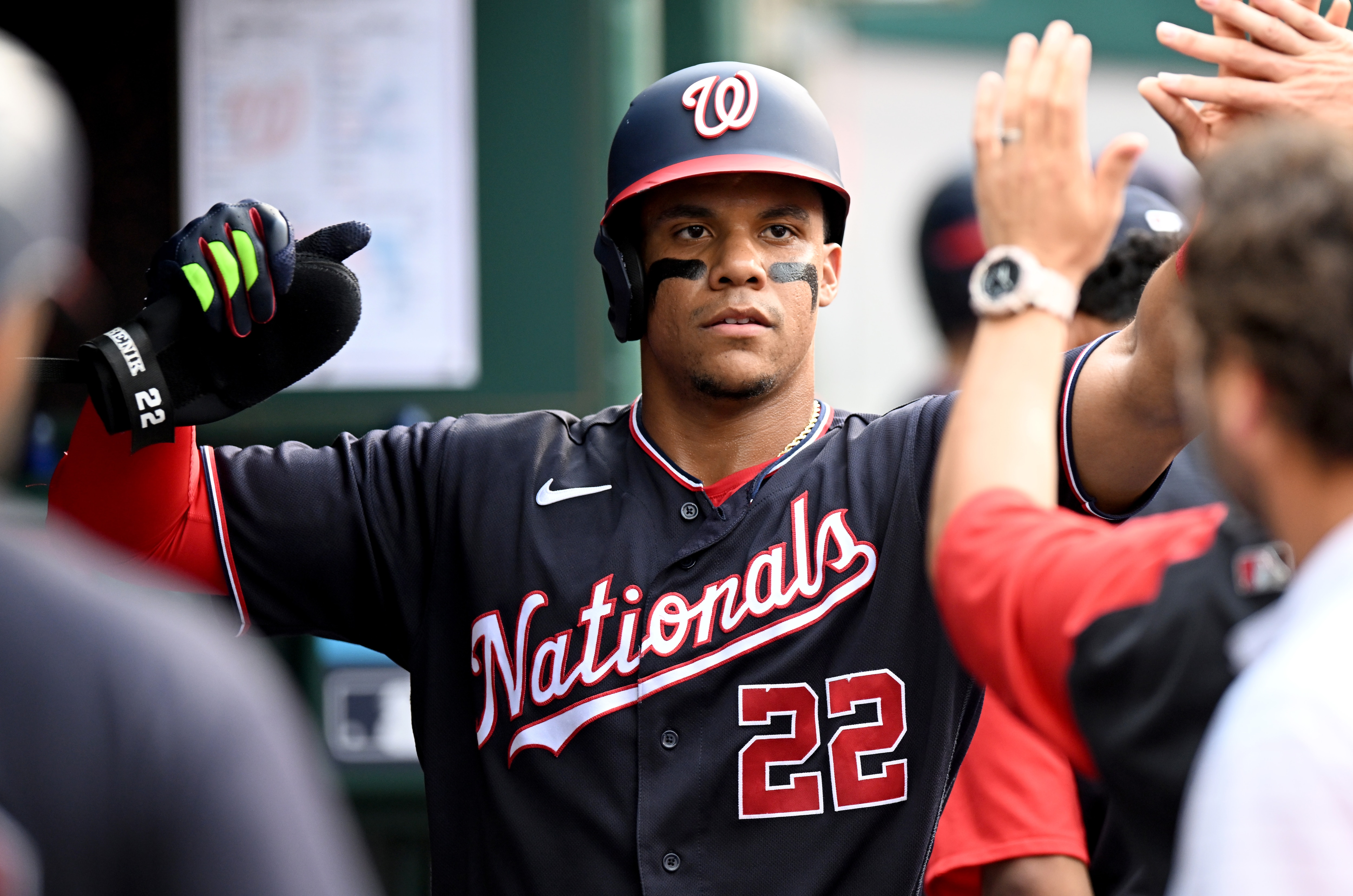 WASHINGTON, DC - JULY 01: Juan Soto #22 of the Washington Nationals celebrates with teammates after scoring in the fourth inning against the Miami Marlins at Nationals Park on July 01, 2022 in Washington, DC. (Photo by Greg Fiume/Getty Images)