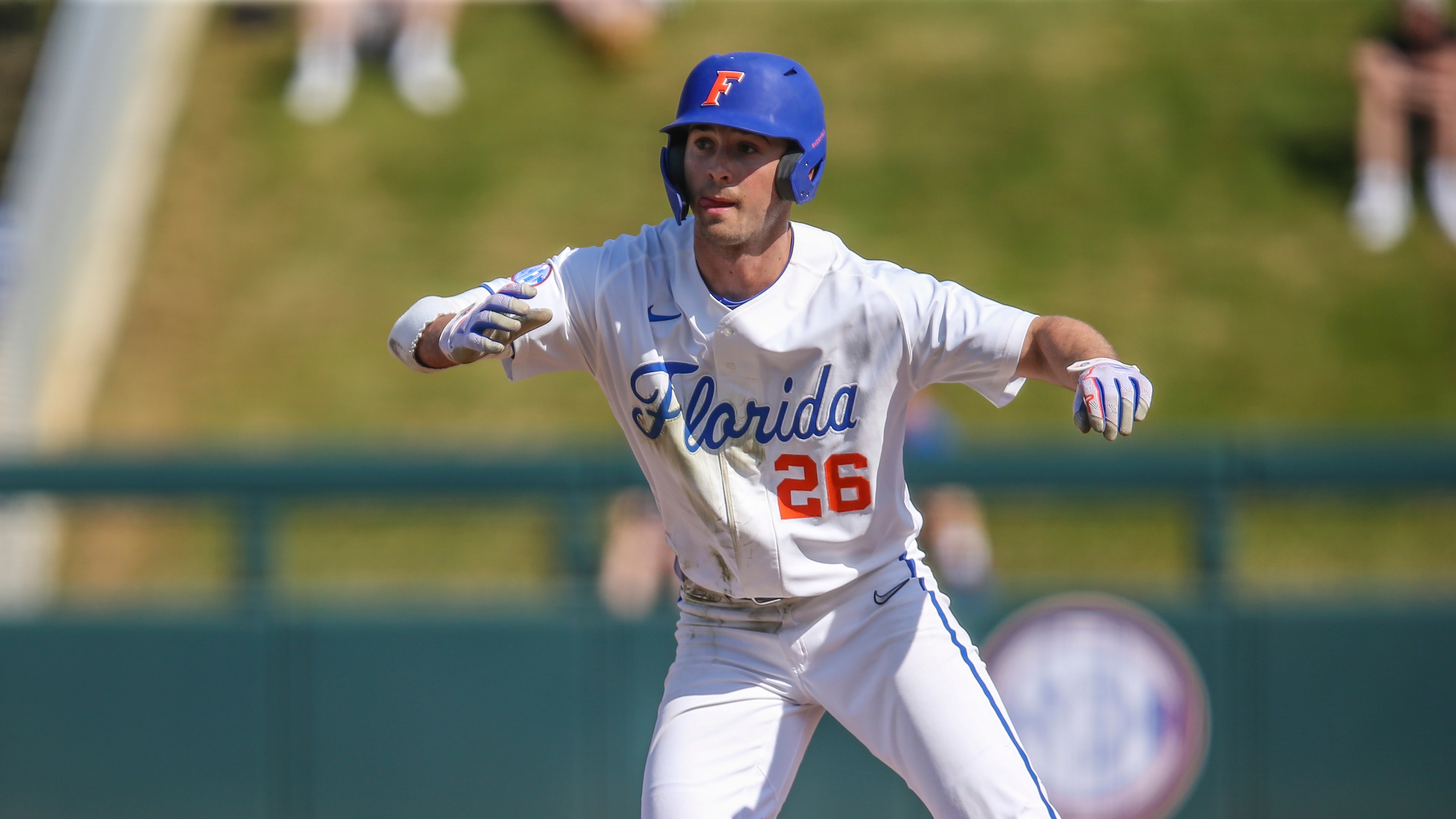 Florida outfielder Sterlin Thompson (26) leads off base during an NCAA baseball game against Georgia State on Sunday, Feb. 27, 2022 in Gainesville, Fla. (AP Photo/Gary McCullough)
