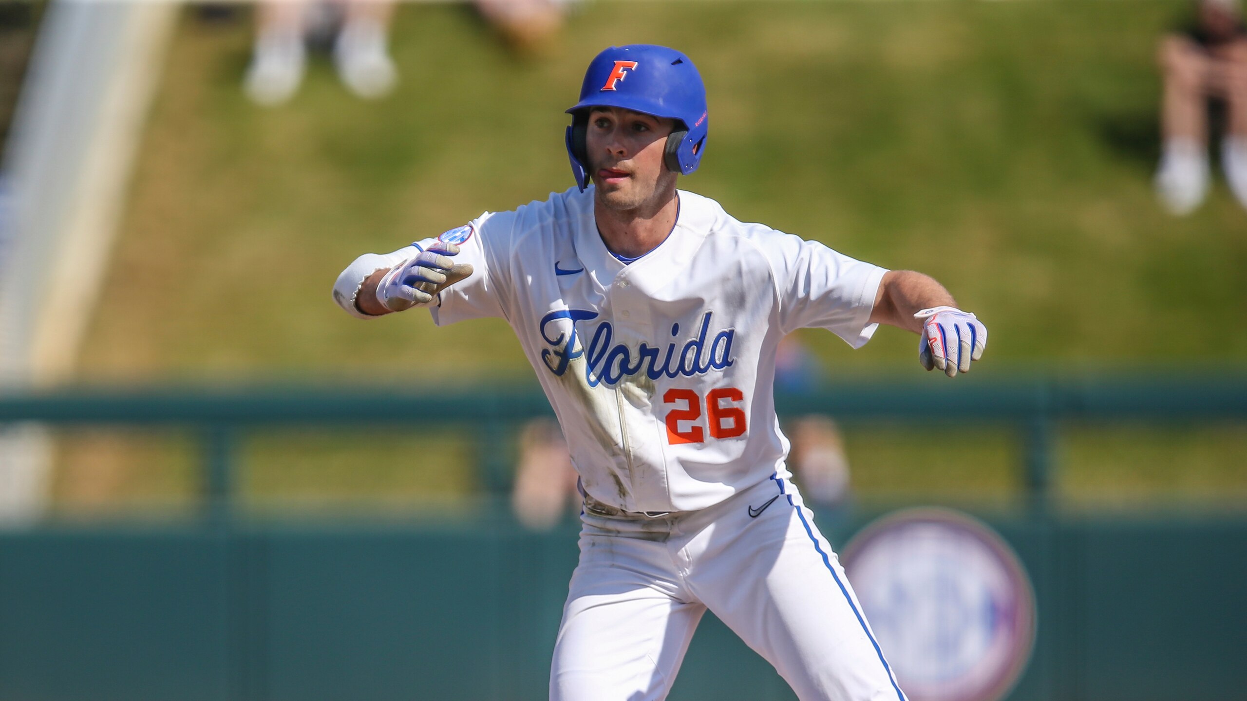 Florida outfielder Sterlin Thompson (26) leads off base during an NCAA baseball game against Georgia State on Sunday, Feb. 27, 2022 in Gainesville, Fla. (AP Photo/Gary McCullough)