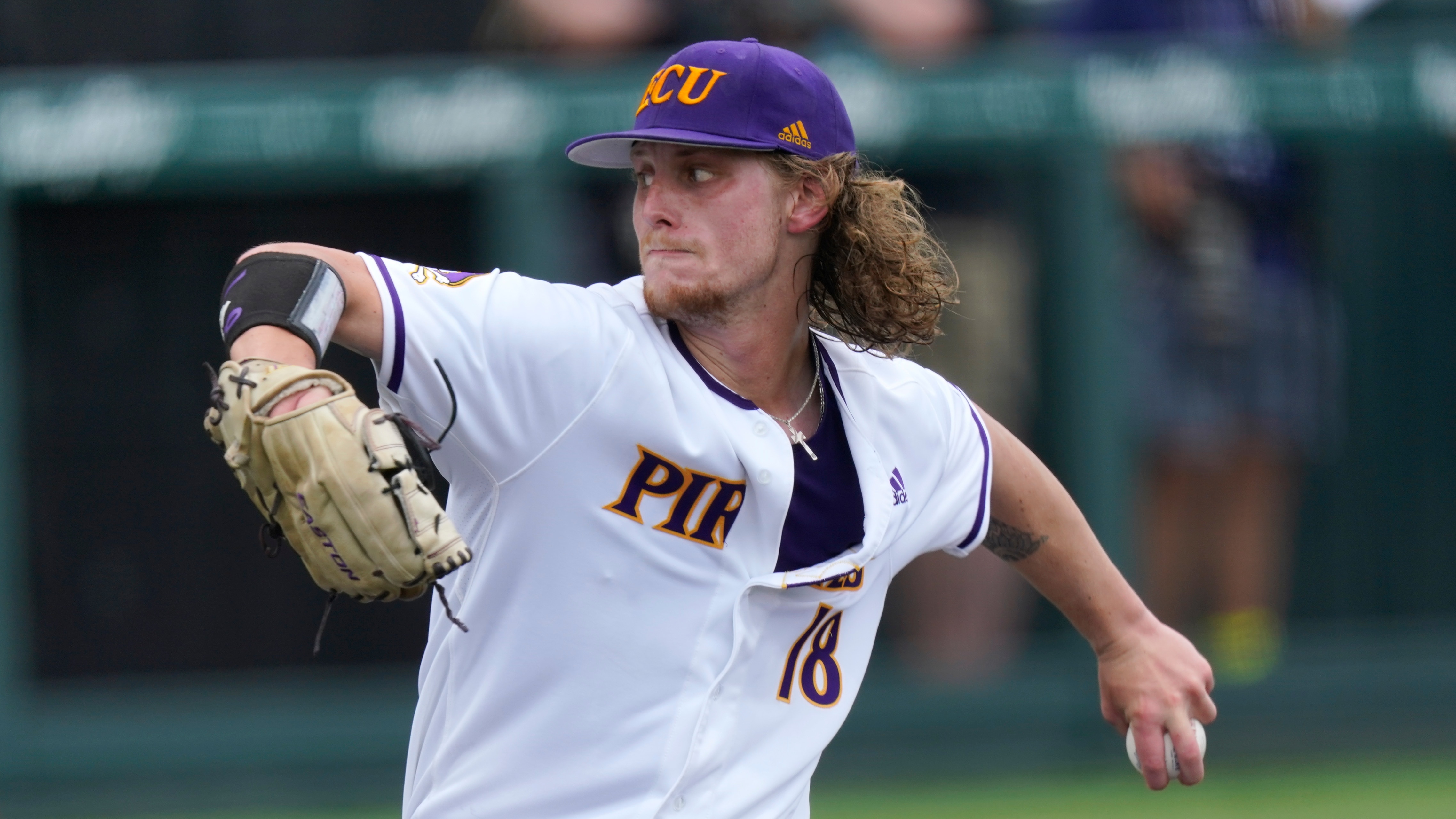 East Carolina pitcher Carson Whisenhunt throws against Vanderbilt in an NCAA college baseball super regional game Saturday, June 12, 2021, in Nashville, Tenn. (AP Photo/Mark Humphrey)