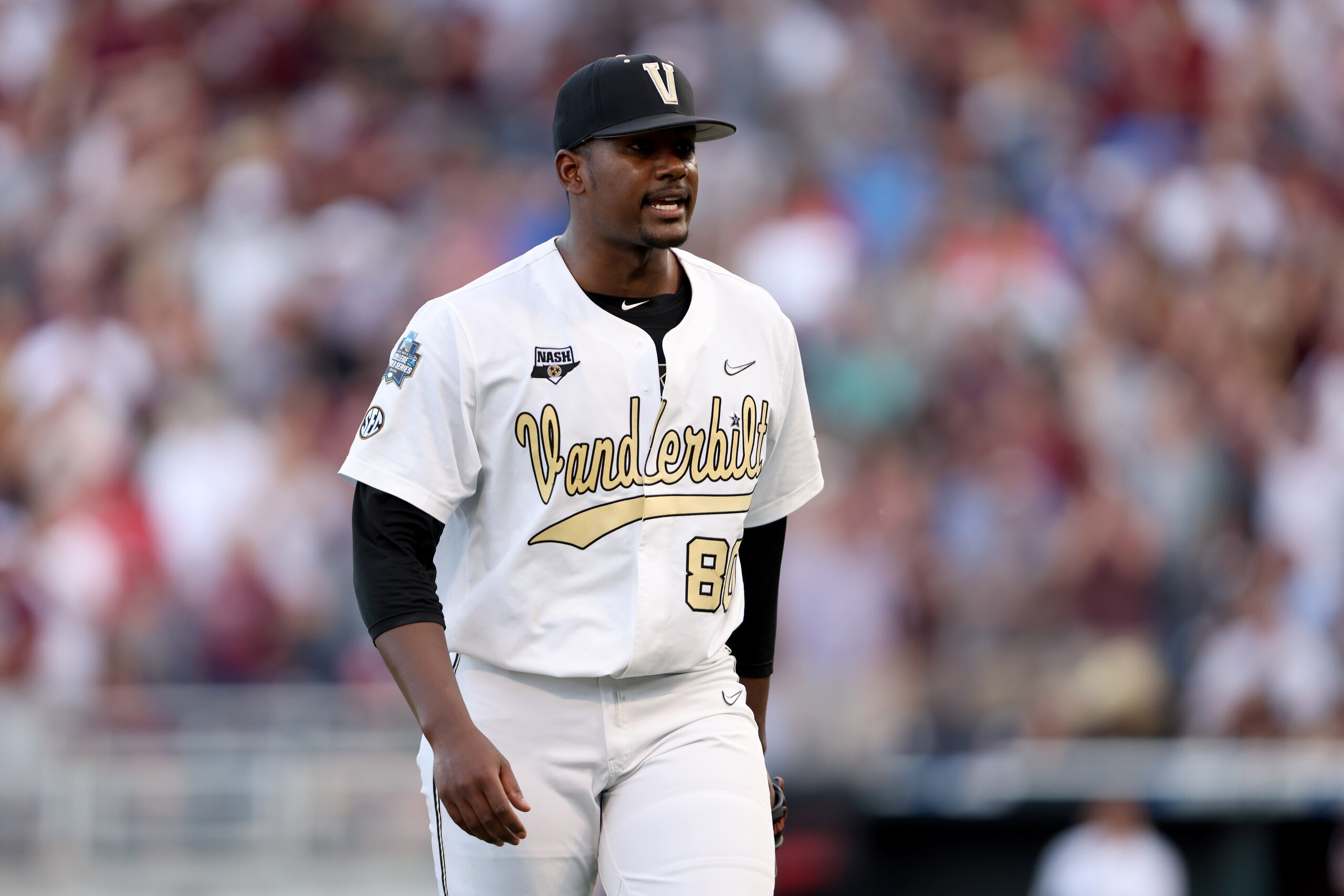 OMAHA, NEBRASKA - JUNE 30: Starting pitcher Kumar Rocker #80 of the Vanderbilt reacts to being pulled from the game against Mississippi St. by Head Coach Tim Corbin of the Vanderbilt in the top of the fifth inning during game three of the College World Series Championship at TD Ameritrade Park Omaha on June 30, 2021 in Omaha, Nebraska. (Photo by Sean M. Haffey/Getty Images) OMAHA, NEBRASKA - JUNE 30: Starting pitcher Kumar Rocker #80 of the Vanderbilt reacts to being pulled from the game against Mississippi St. by Head Coach Tim Corbin of the Vanderbilt in the top of the fifth inning during game three of the College World Series Championship at TD Ameritrade Park Omaha on June 30, 2021 in Omaha, Nebraska. (Photo by Sean M. Haffey/Getty Images)