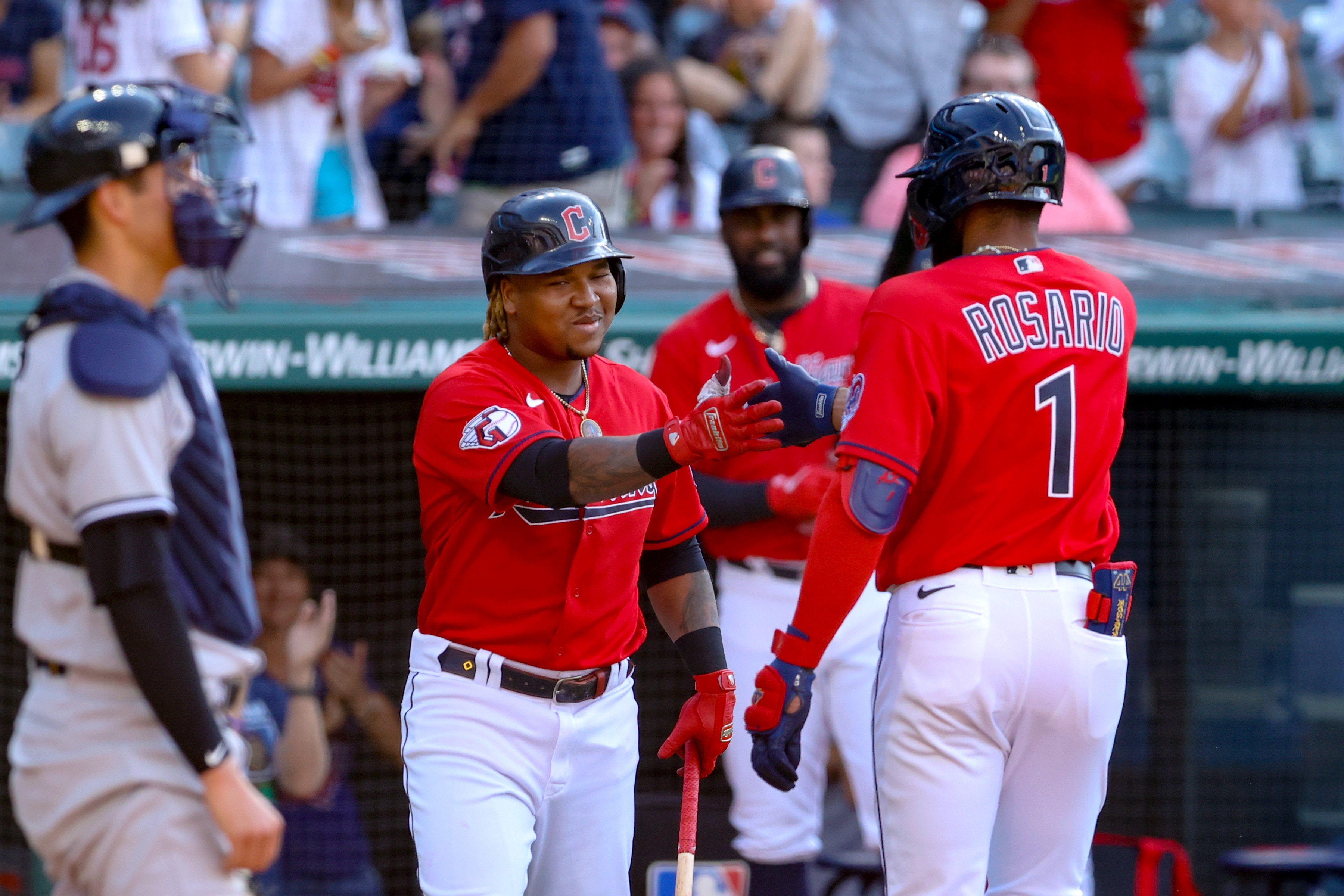 CLEVELAND, OH - JULY 02: Cleveland Guardians shortstop Amed Rosario (1) is congratulated by Cleveland Guardians designated hitter Jose Ramirez (11) after hitting a home run during the first inning of game 2 of the Major League Baseball doubleheader between the New York Yankees and Cleveland Guardians on July 2, 2022, at Progressive Field in Cleveland, OH. (Photo by Frank Jansky/Icon Sportswire via Getty Images)