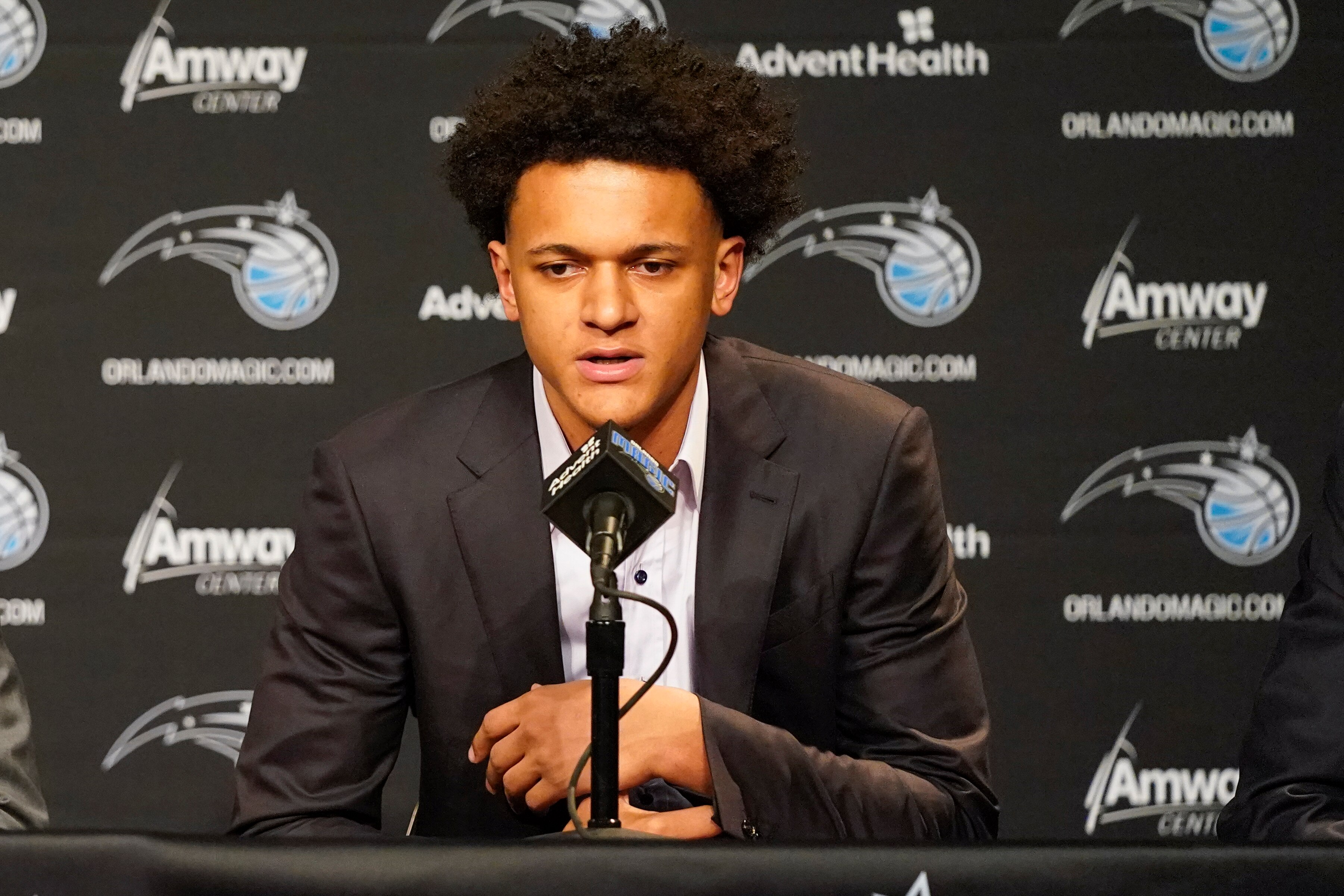 Orlando Magic's No. 1 draft pick, forward Paolo Banchero, answers questions at an NBA basketball news conference, Friday, June 24, 2022, in Orlando, Fla. (AP Photo/John Raoux)