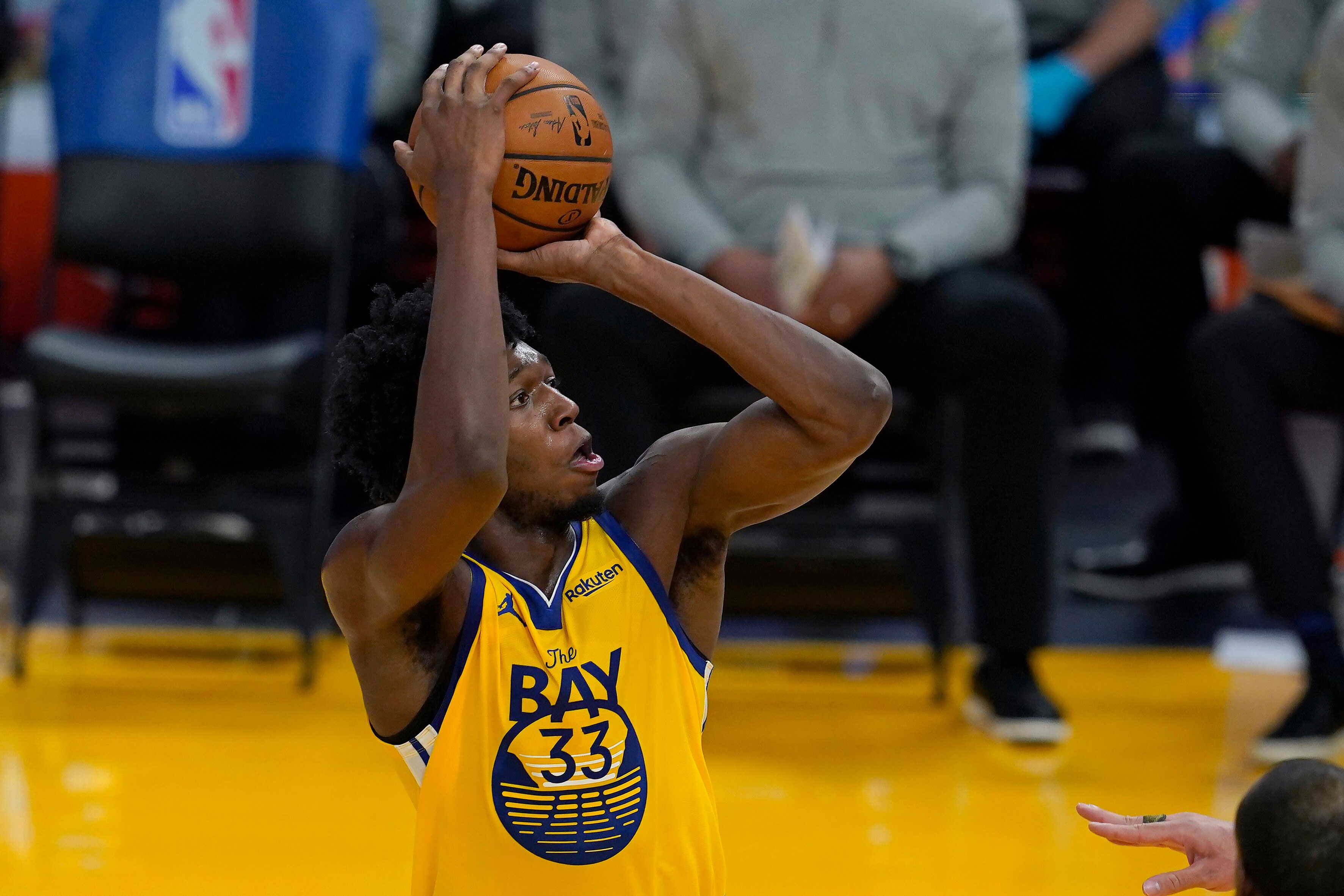 Golden State Warriors center James Wiseman (33) shoots against the Milwaukee Bucks during the first half of an NBA basketball game in San Francisco, Tuesday, April 6, 2021. (AP Photo/Jeff Chiu)
